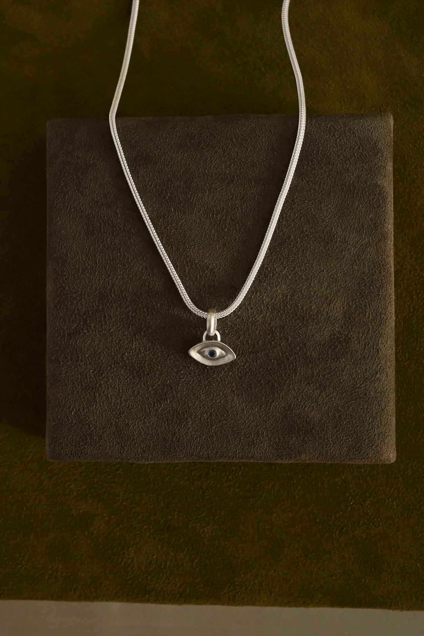 Dunton-Ellerkamp-Silver-Sapphire-Evil-Eye-On-Chain-1.jpg.jpg