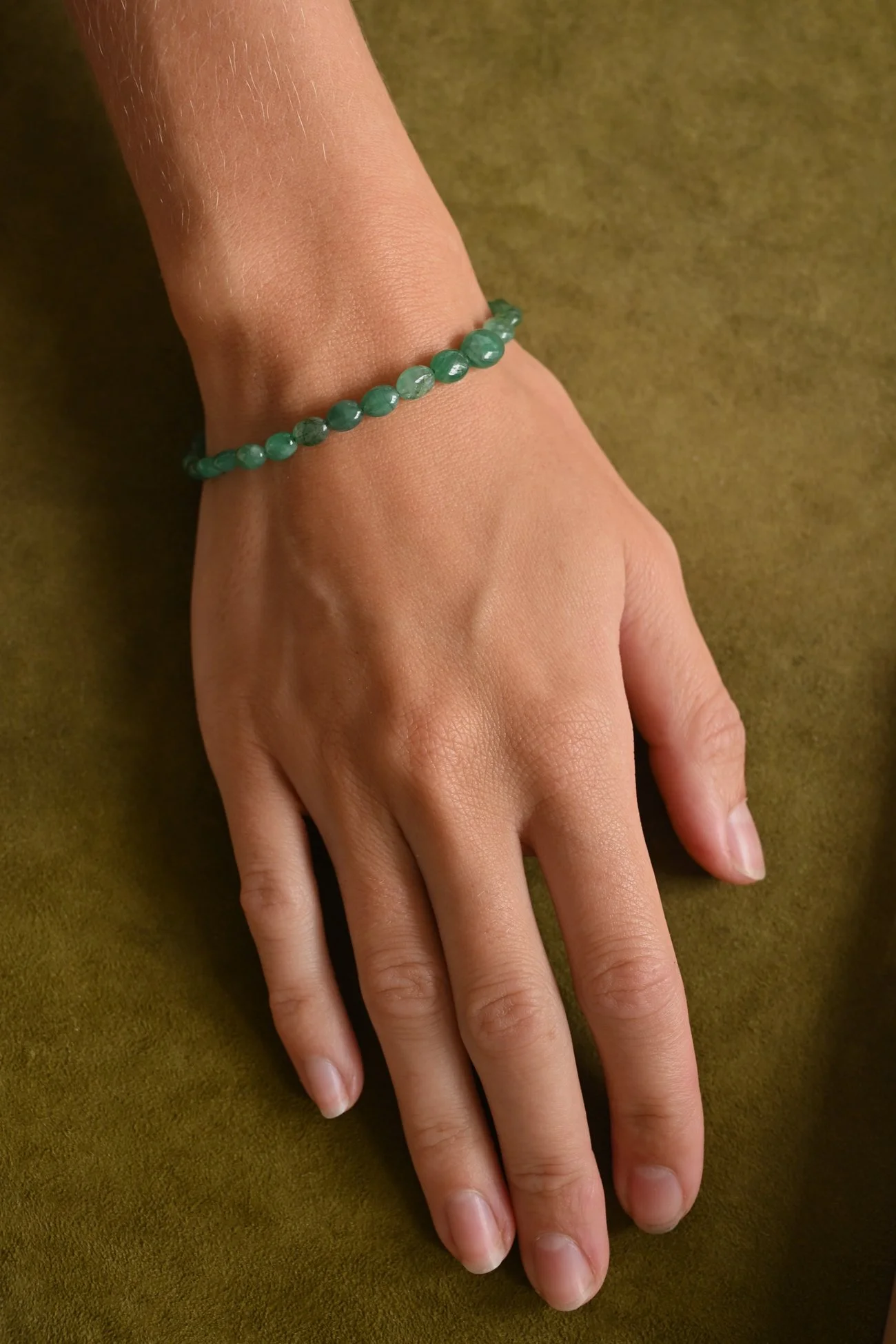 Dunton-Ellerkamp-Emerald-Silver-Bracelet--On-Figure-2.jpg