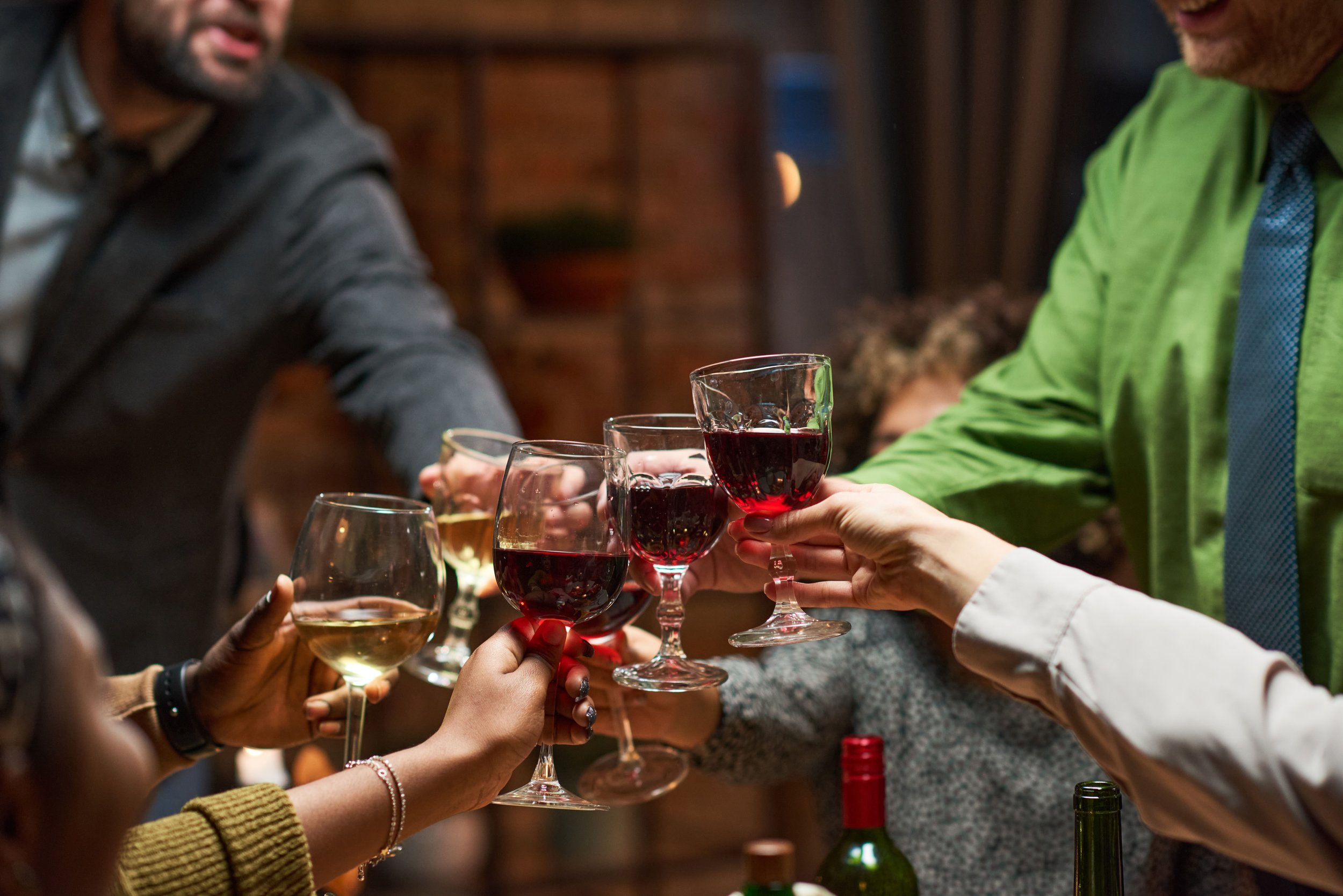 people-drinking-red-wine-at-party-2021-12-09-08-10-36-utc.jpg