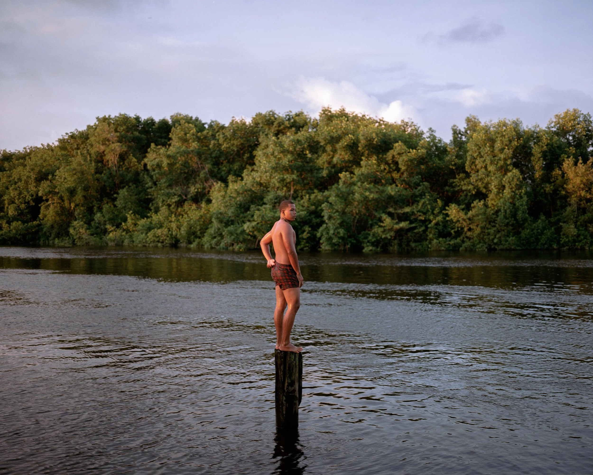 20250528-boy on pillar in river ektar 1.jpg