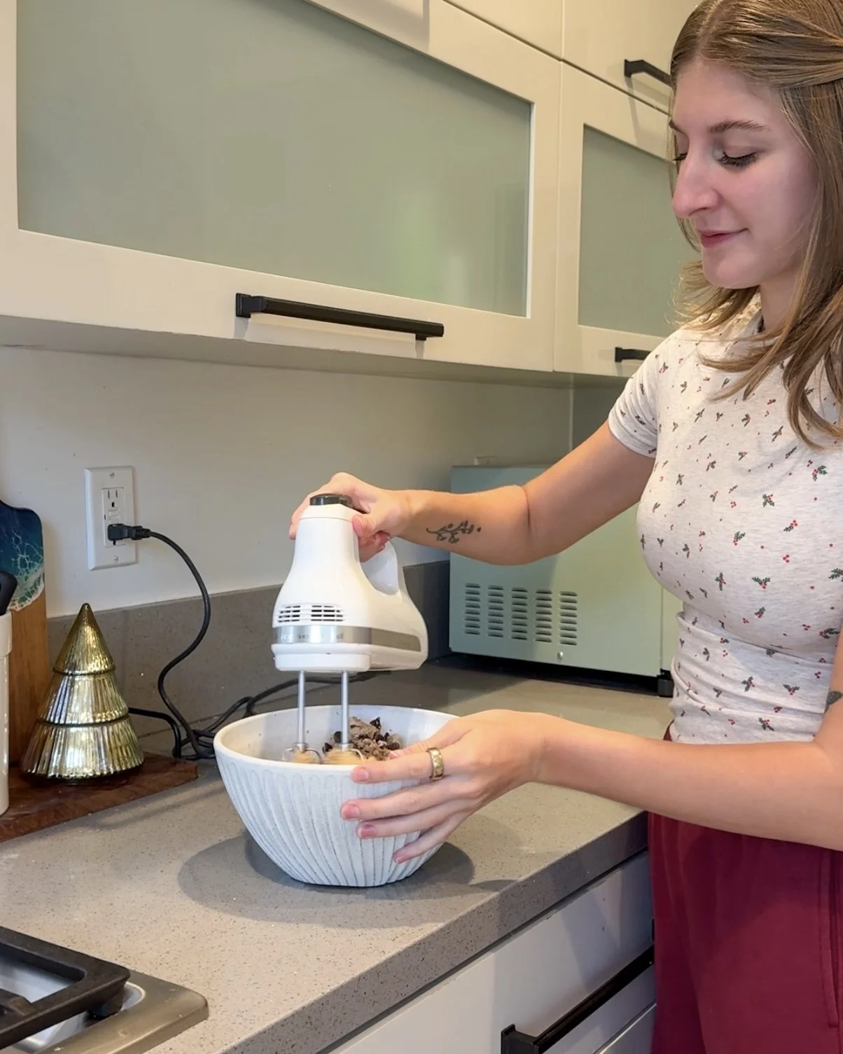 Girl in kitchen baking allergy-friendly Holiday Cookies