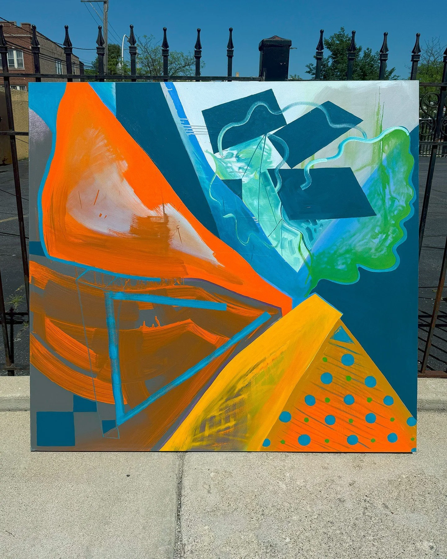 Photographing my larger works outside in the sun really captures their vibrance and energy. This piece has always been a favorite because of the big bang of colors, geometric shapes, and the hint of nature with the abstract leaf forms at the top righ