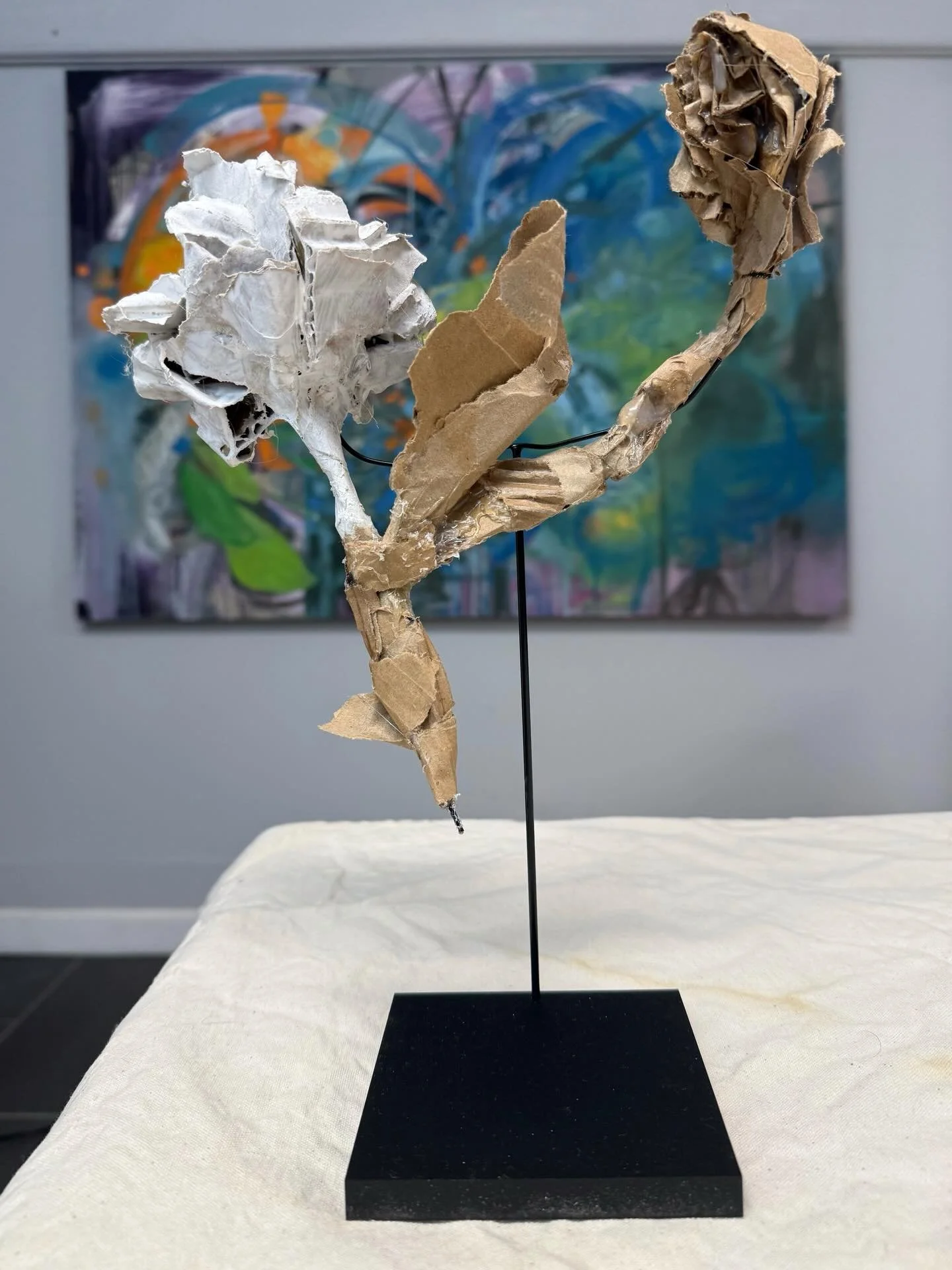 WIP ALERT! I&rsquo;m working on some small sculptures (tabletop cuties) and trying to finish the large painting in the back. #HolidayGoals #CardboardSculpture