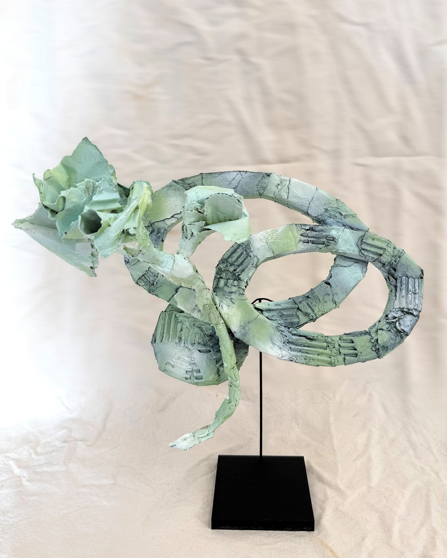 Sculptures made from cardboard: sustainable and surprisingly durable. Who knew that when you glue together a ton of tiny pieces of cardboard, the objects become remarkably strong?! These are small, experimental tabletop works, but the possibilities a