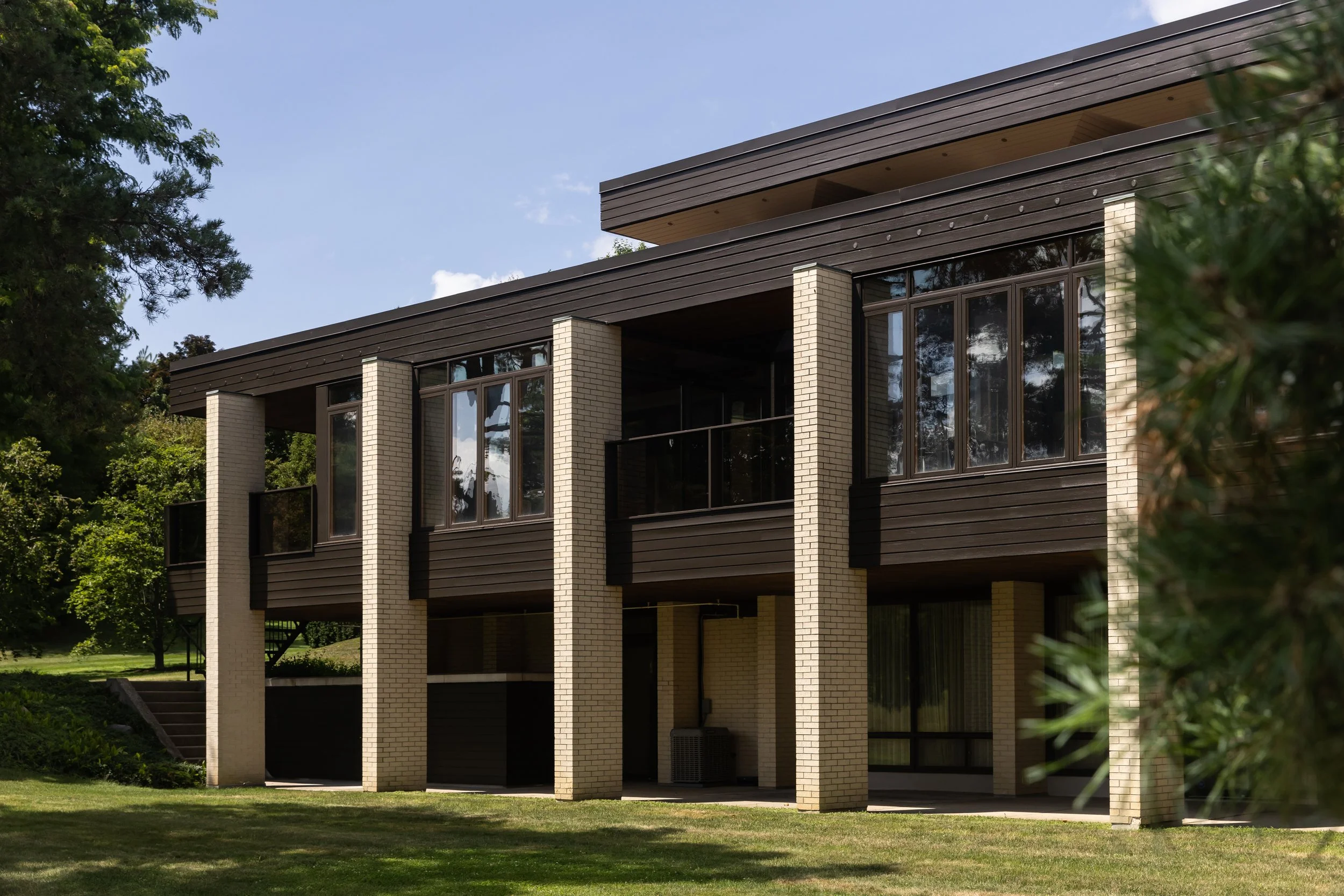 McHugh Painting service. Exterior black walls and bricks painting