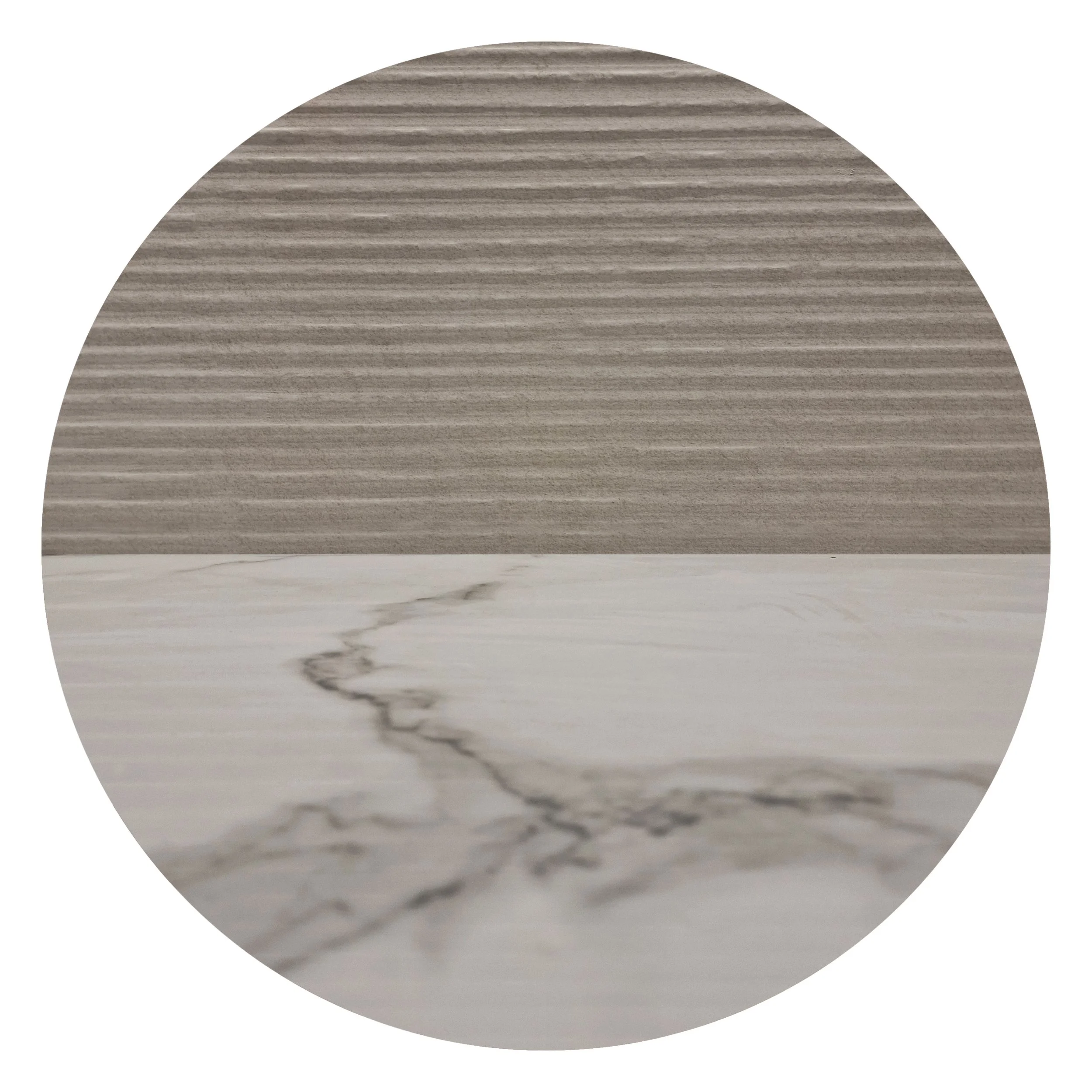 Close-up of a textured, gray, ridged surface with marble-like white and gray veining.