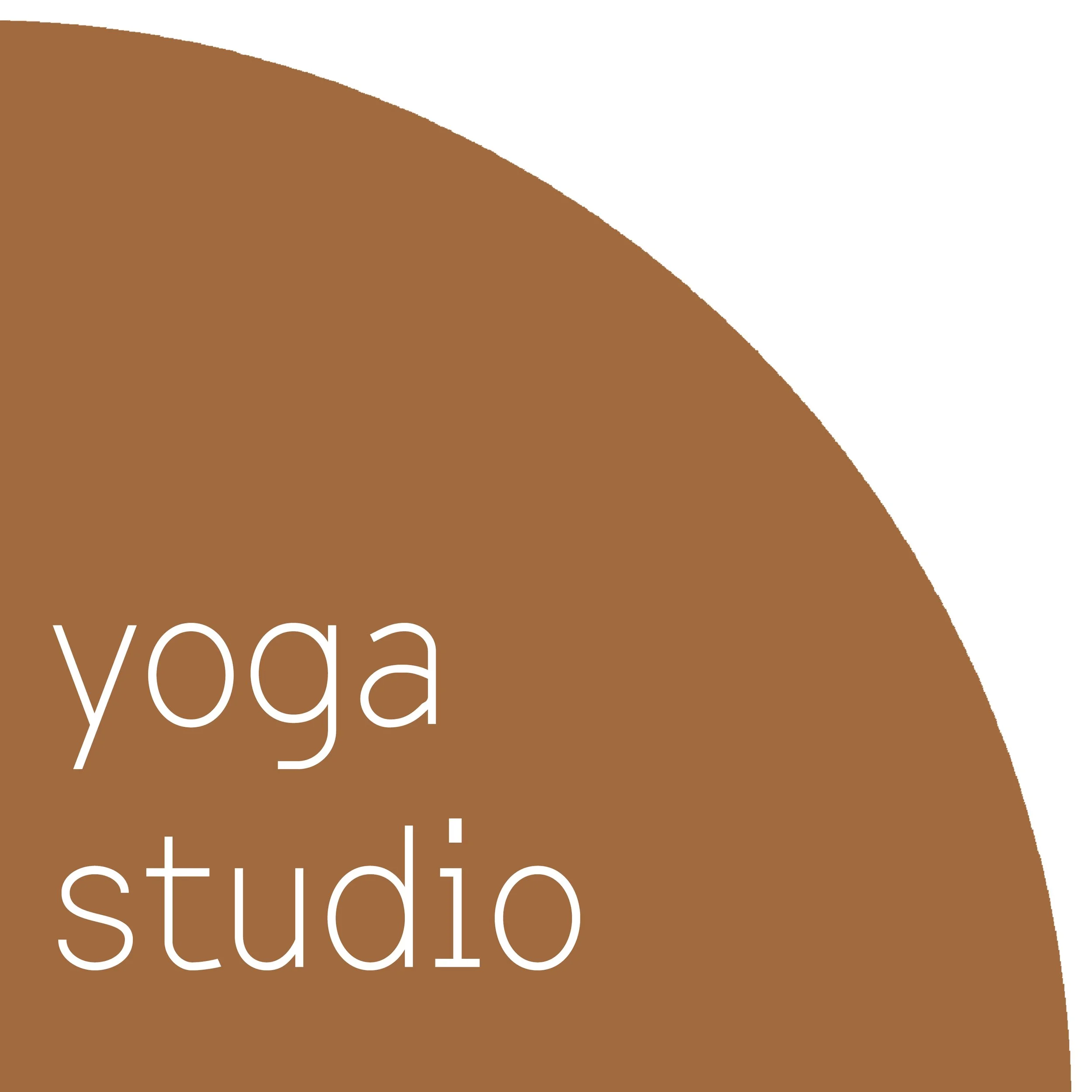 Close-up of a book cover titled 'YOGA' with the subtitle beneath, featuring a brown and white color scheme with large white text.