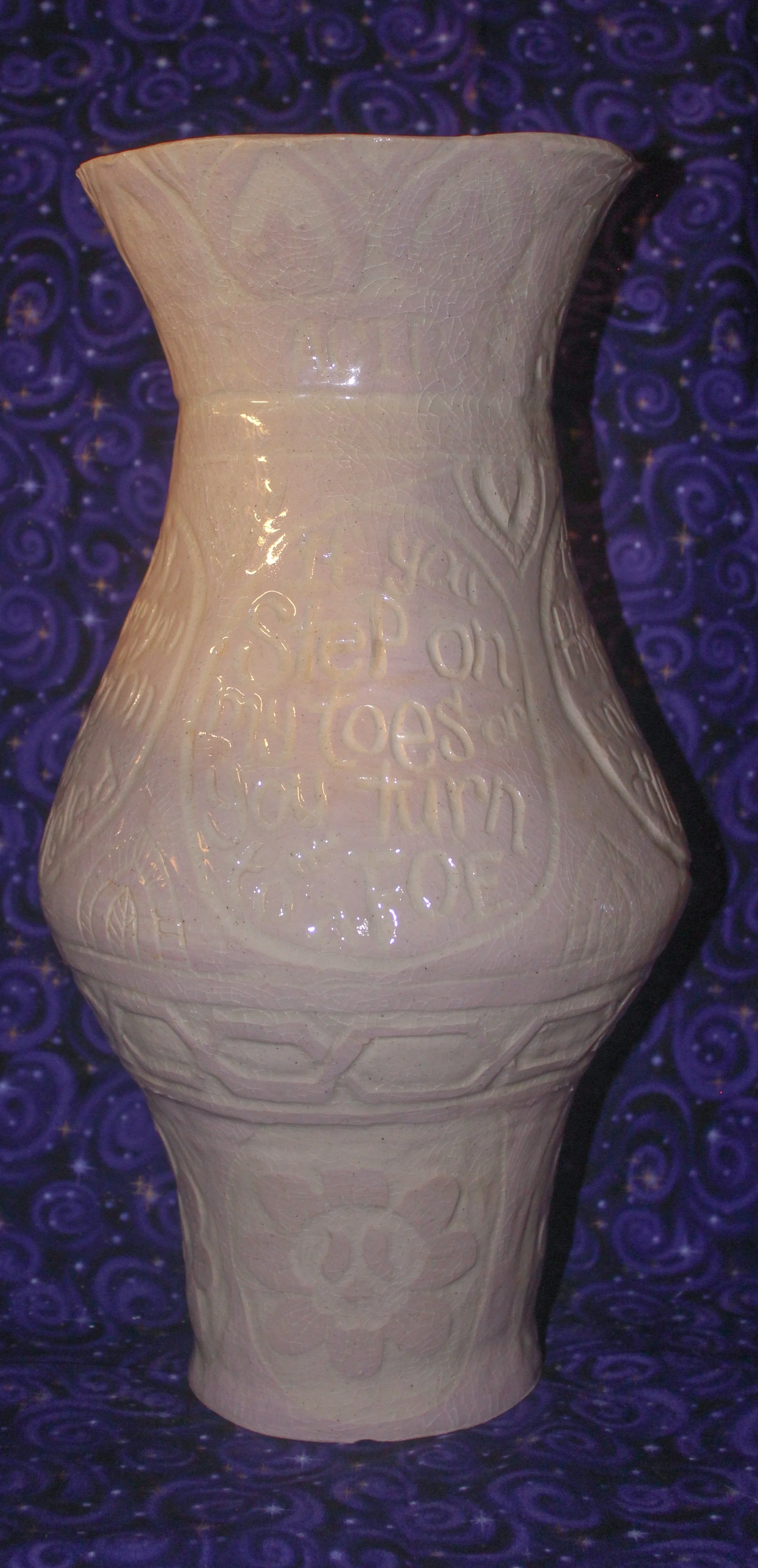 Skull Flower, handbuilt vase with a quote from skull flower by rico natsty. 