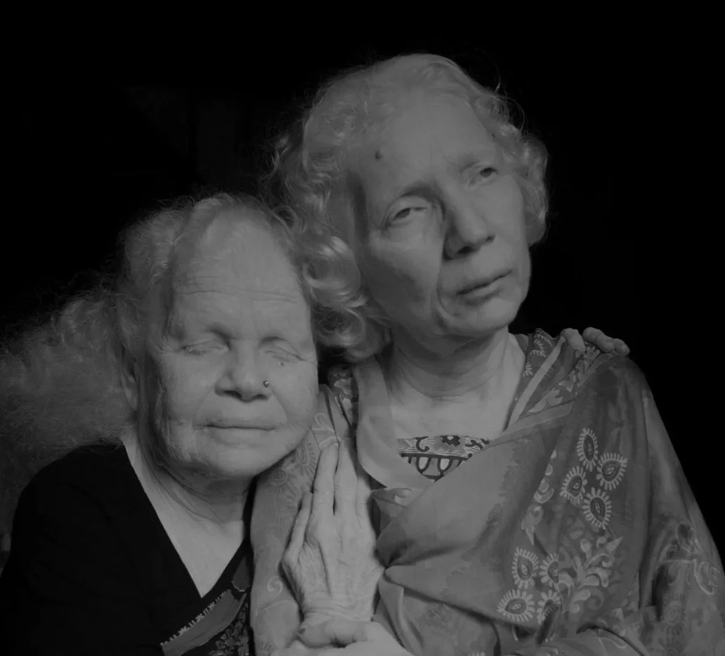 Two Sisters in Lifelong Isolation