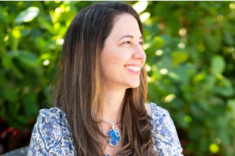 Dr. Isabel Pérez, Biological Dentist and Integrative Health Consultant, sharing insights on body wisdom and whole-person health.