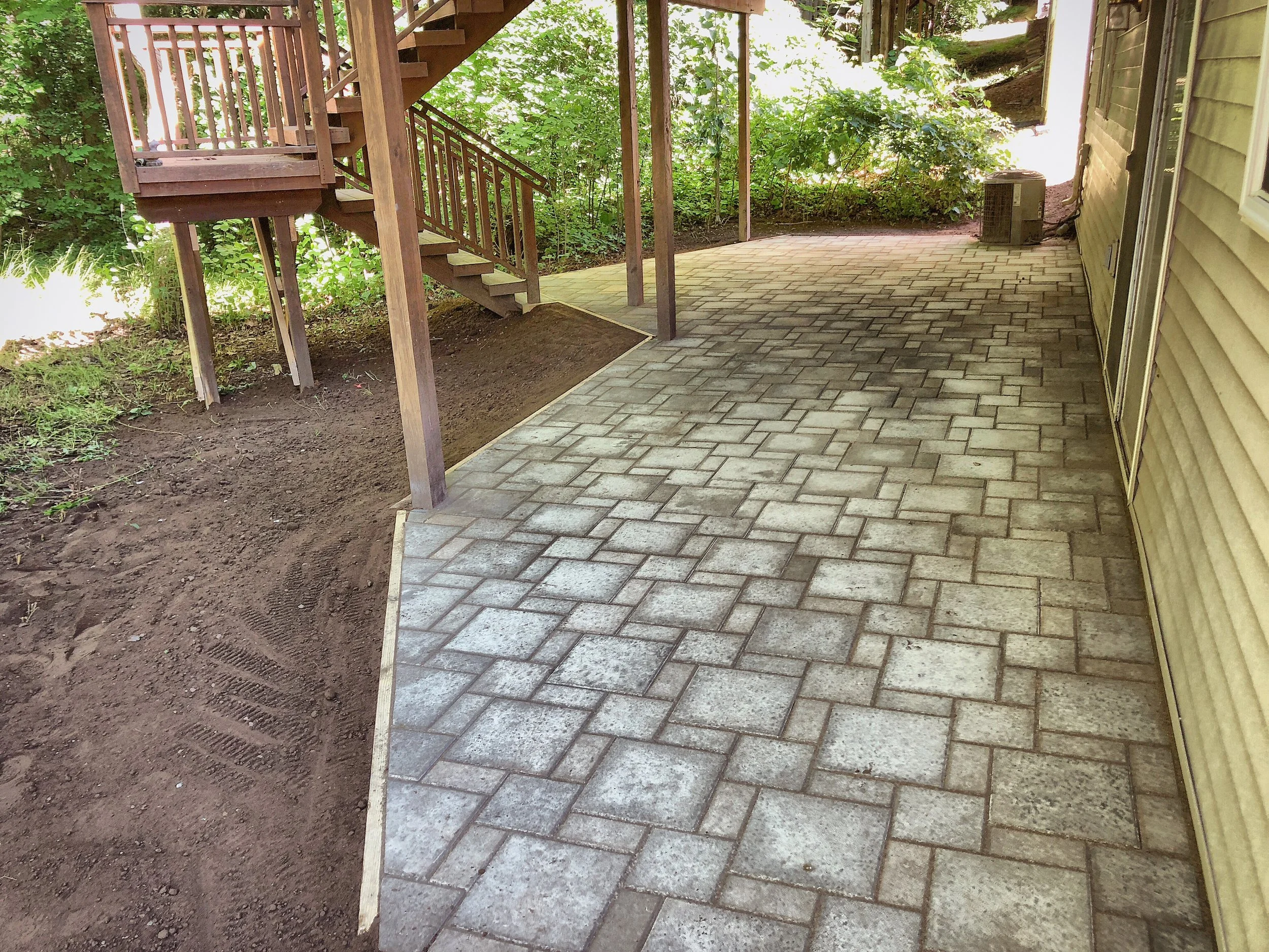 Ann Arbor, MI - Brick paver patio and wood deck. 