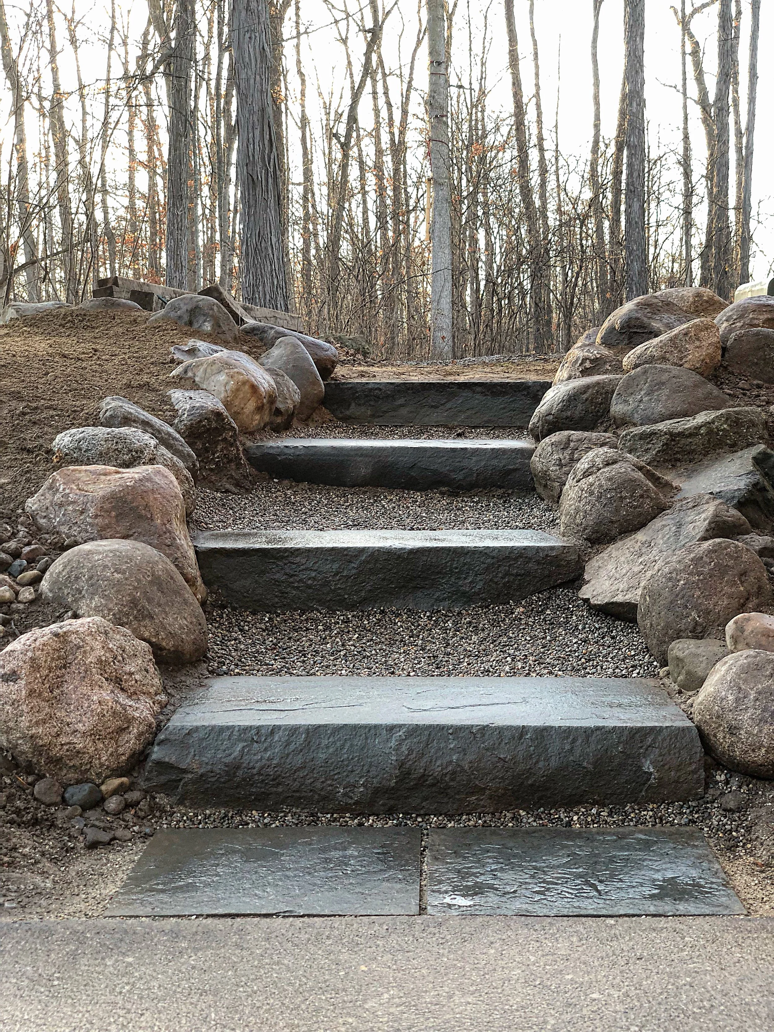 Ann Arbor, MI - Stone steps with boulder wall. 