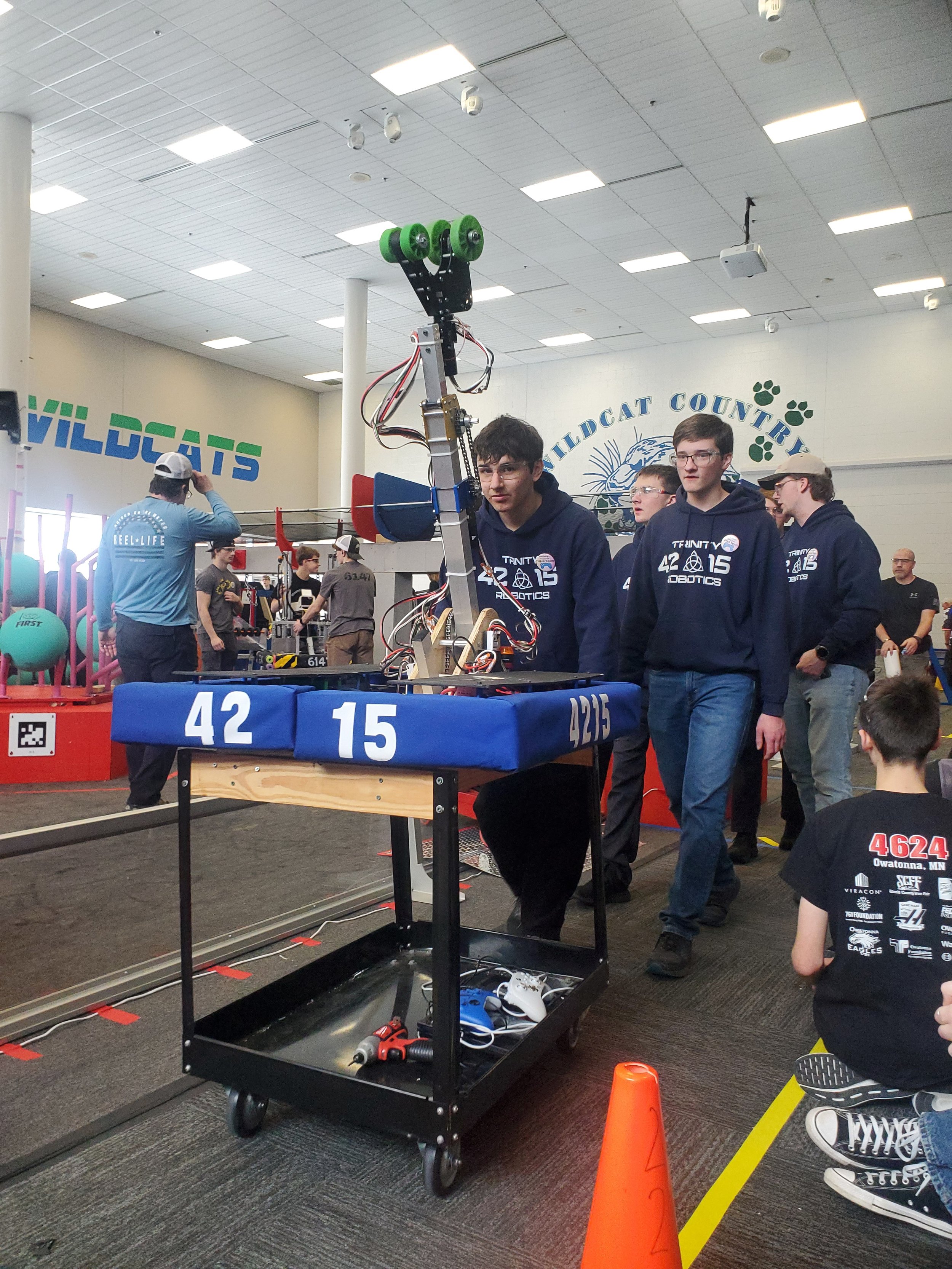 Rolling our robot back to the pit after a match. 2/15/25
