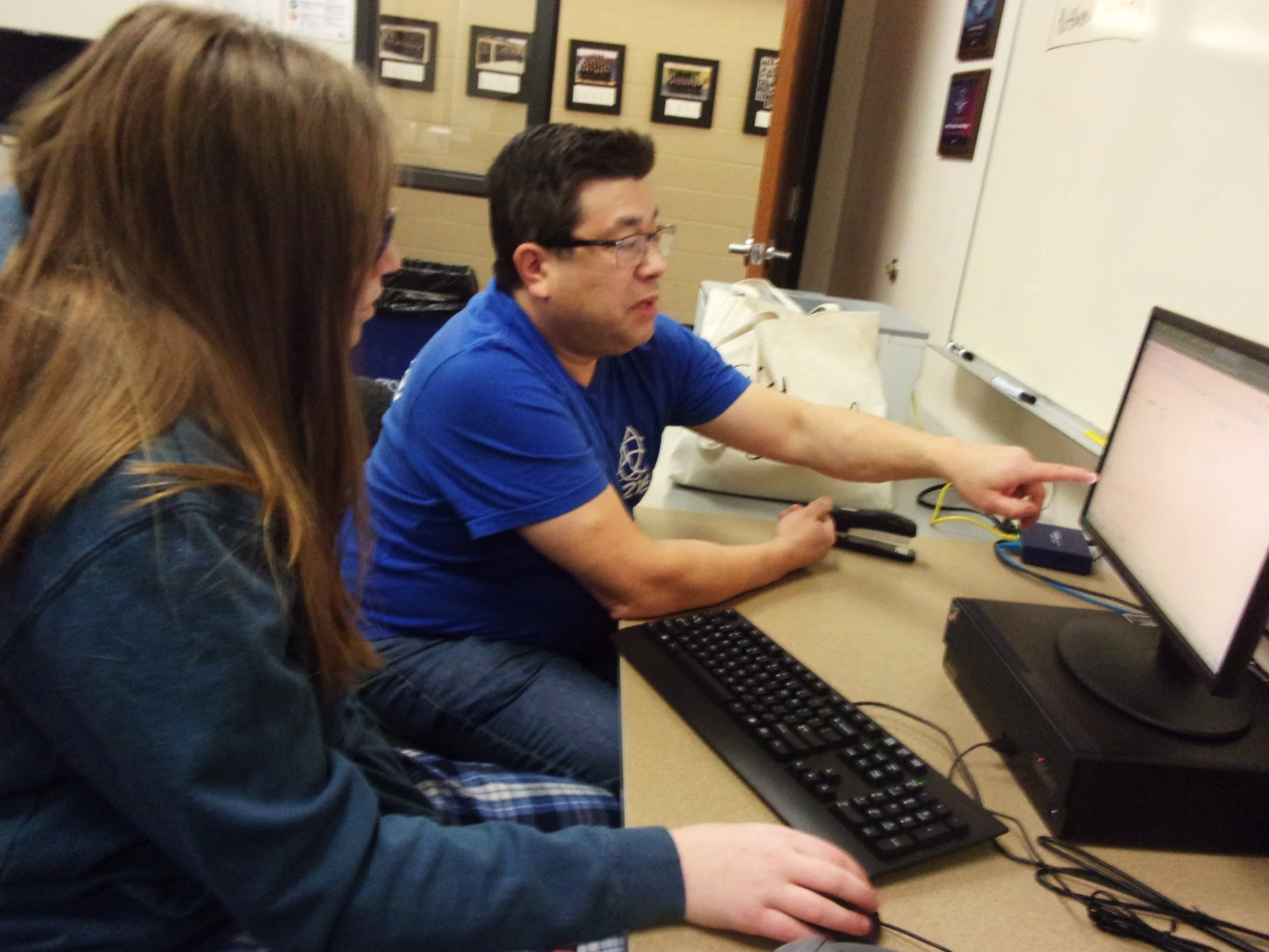 Coach helping business team