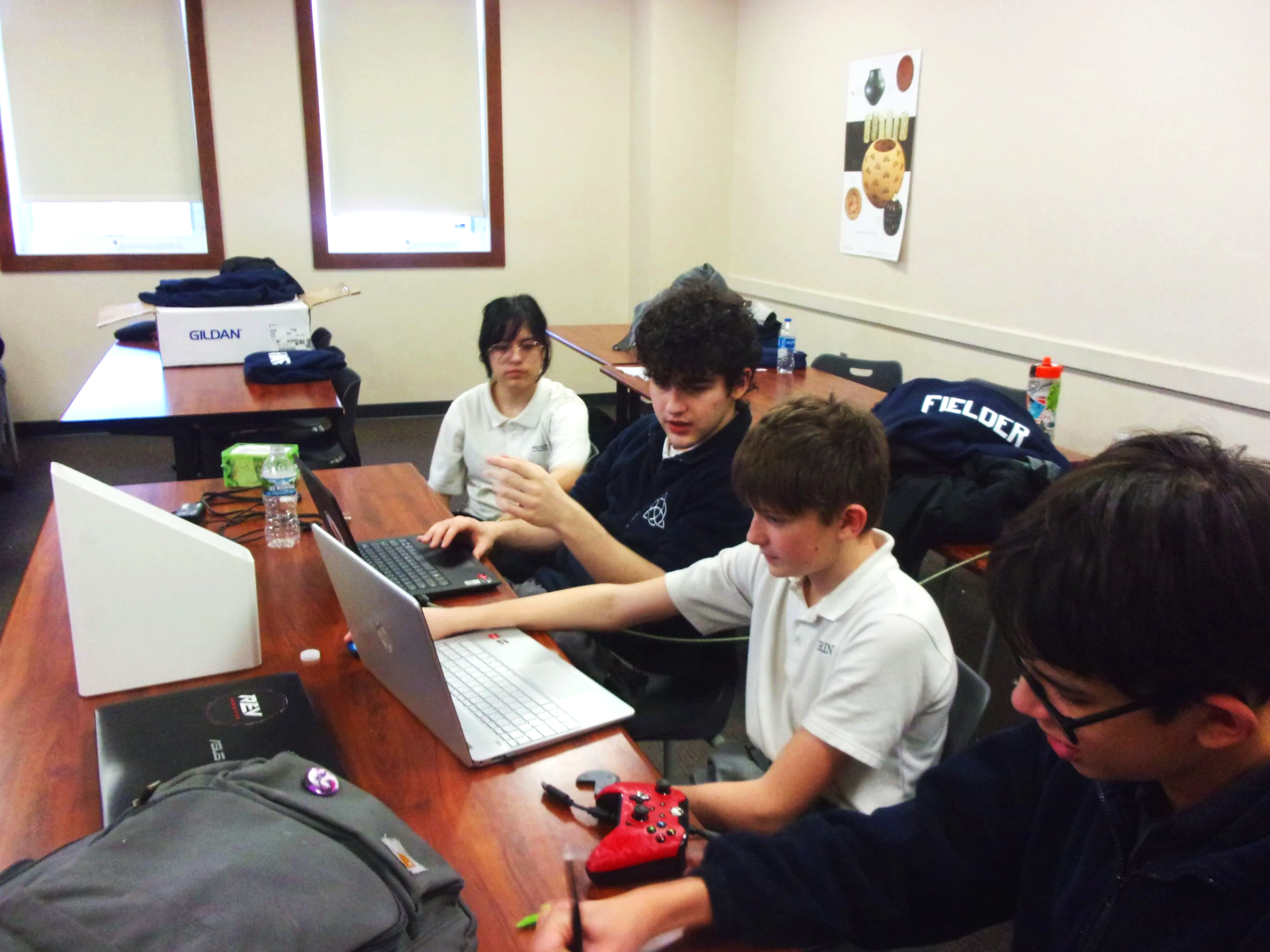 Programing team helping each other.