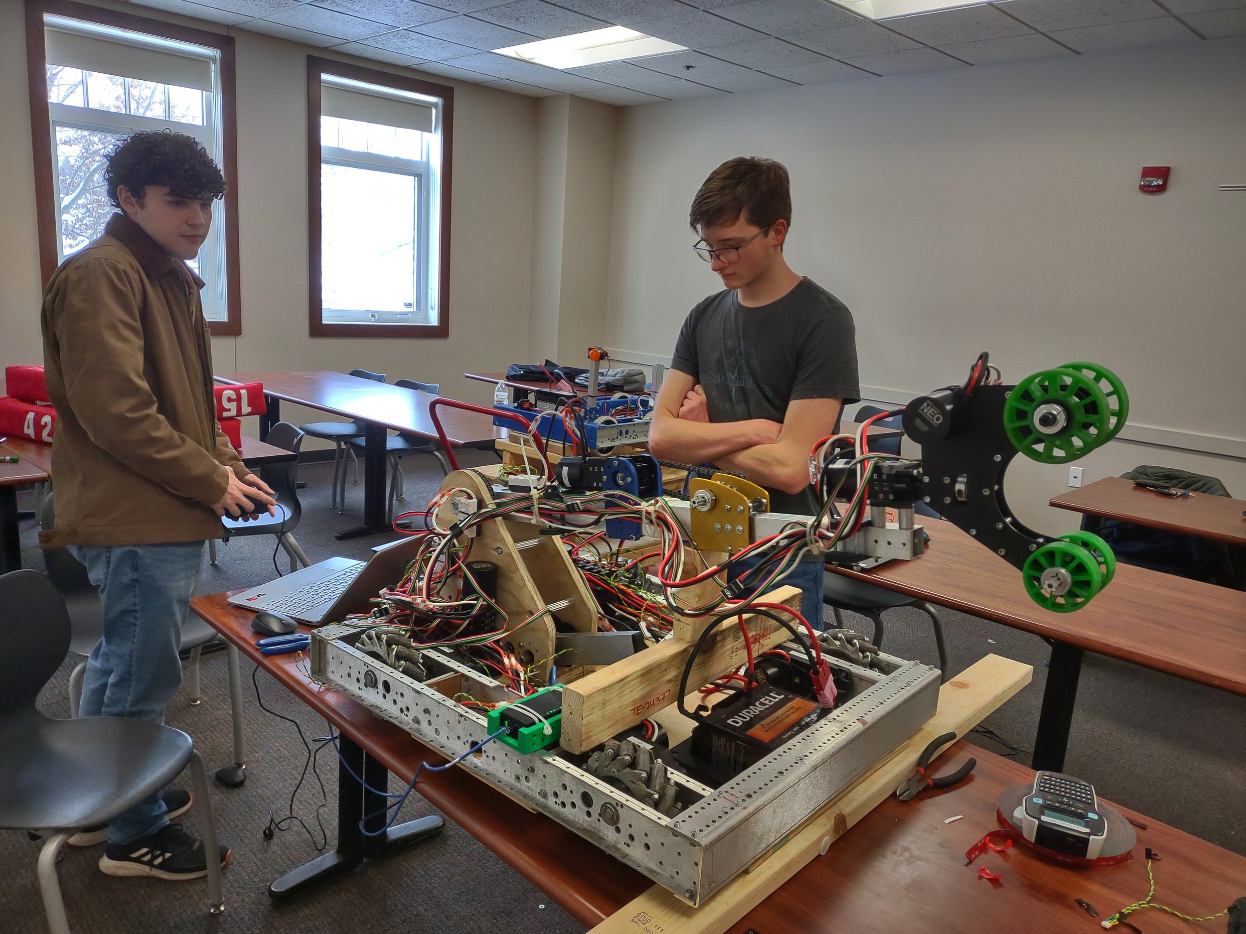 Even with all its parts and wires attached, the robot can be perplexing! 2/8/25