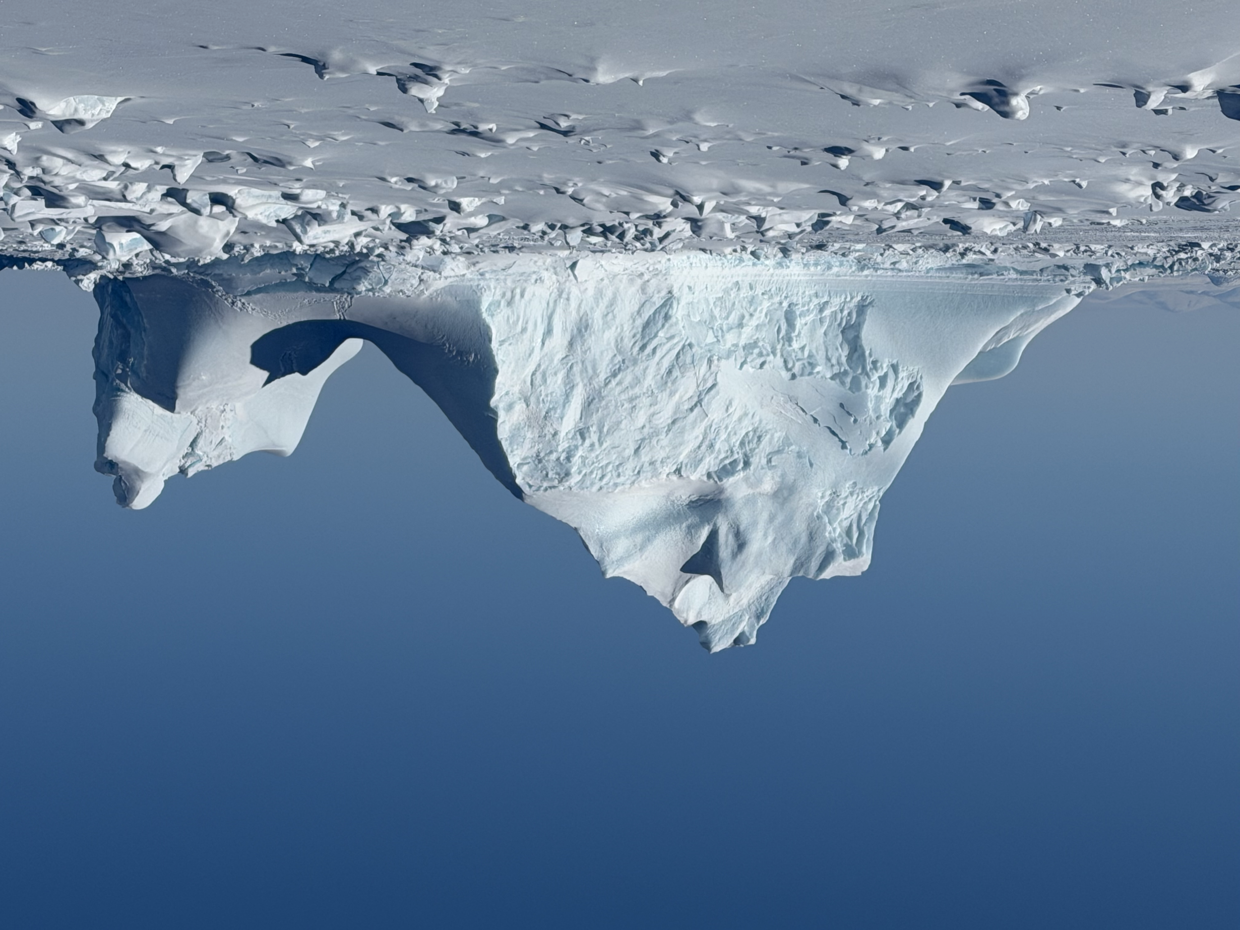 Mountainous icebergs that have been locked in the frozen ocean for the long winter. 