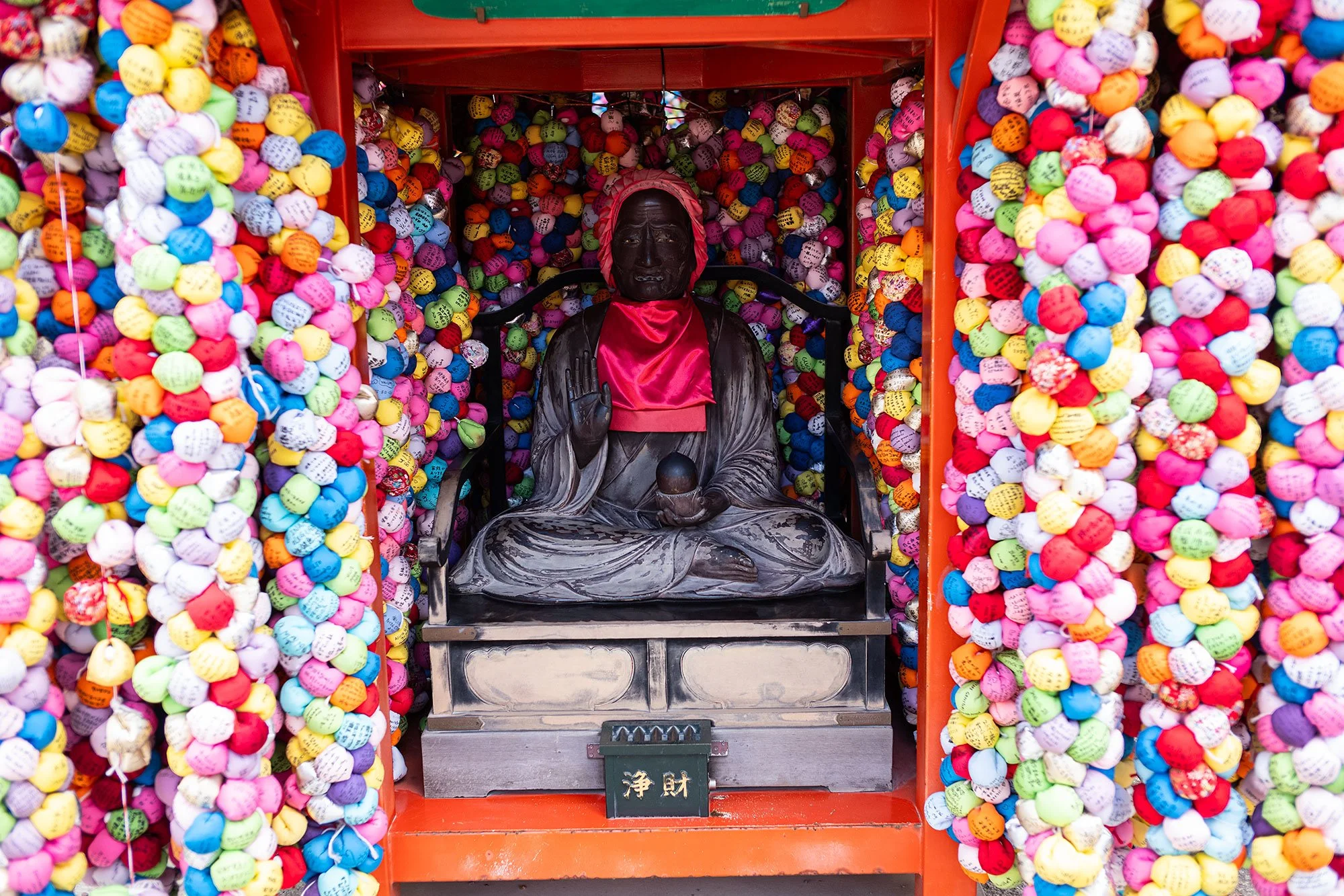 Kukurizaru adorning Yasaka Kōshin-dō Temple, Kyoto, Japan.