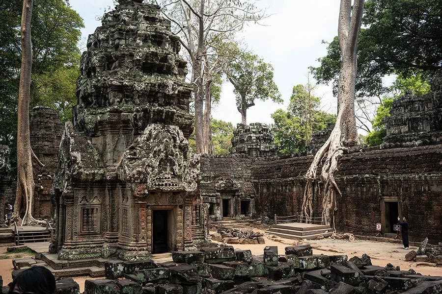 Angkor II: Ta Prohm, Angkor Thom, Bayon, and sunset at Phnom Bakheng.