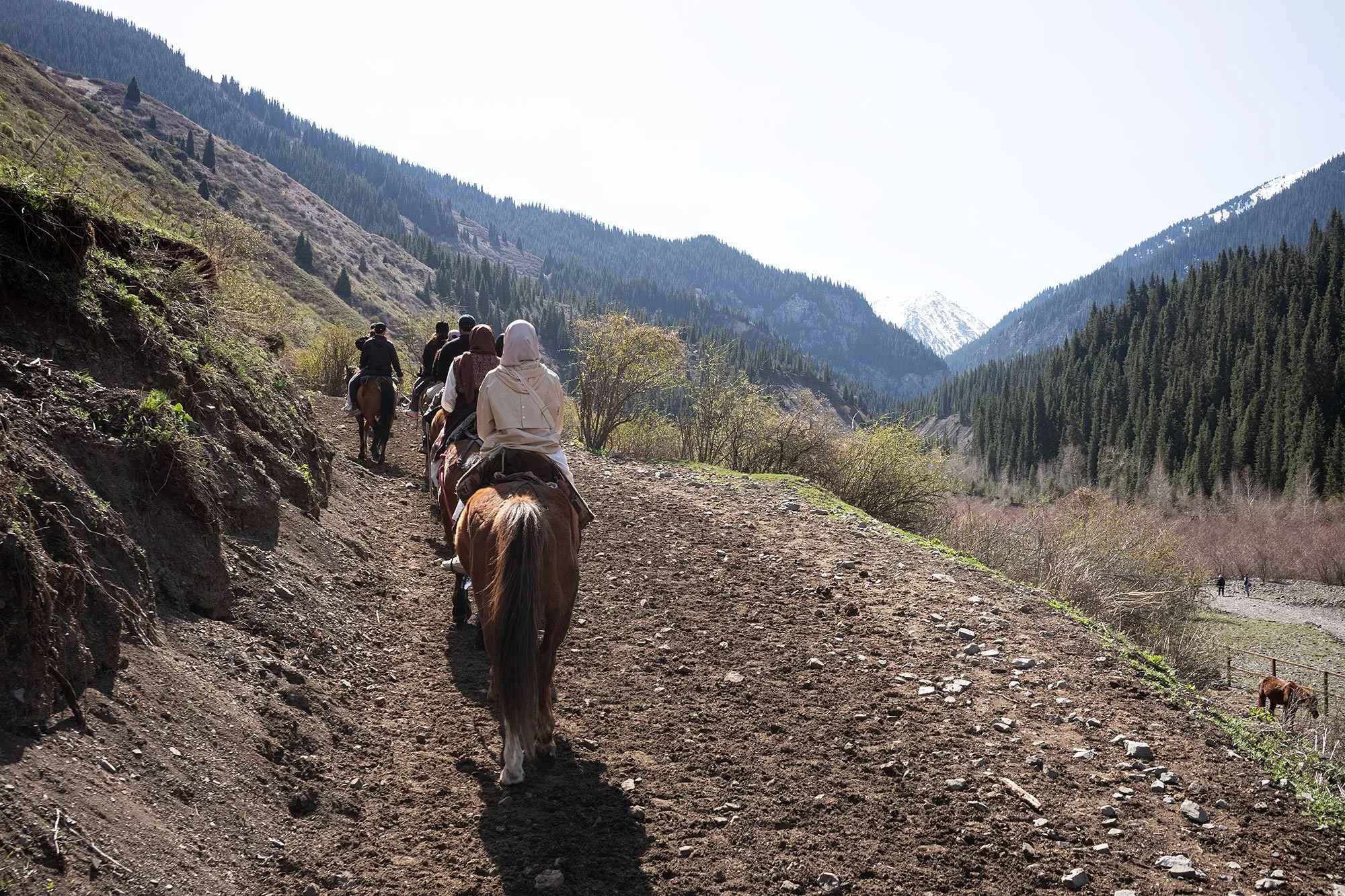 On horseback to Kaindy Lake, Kazakhstan.