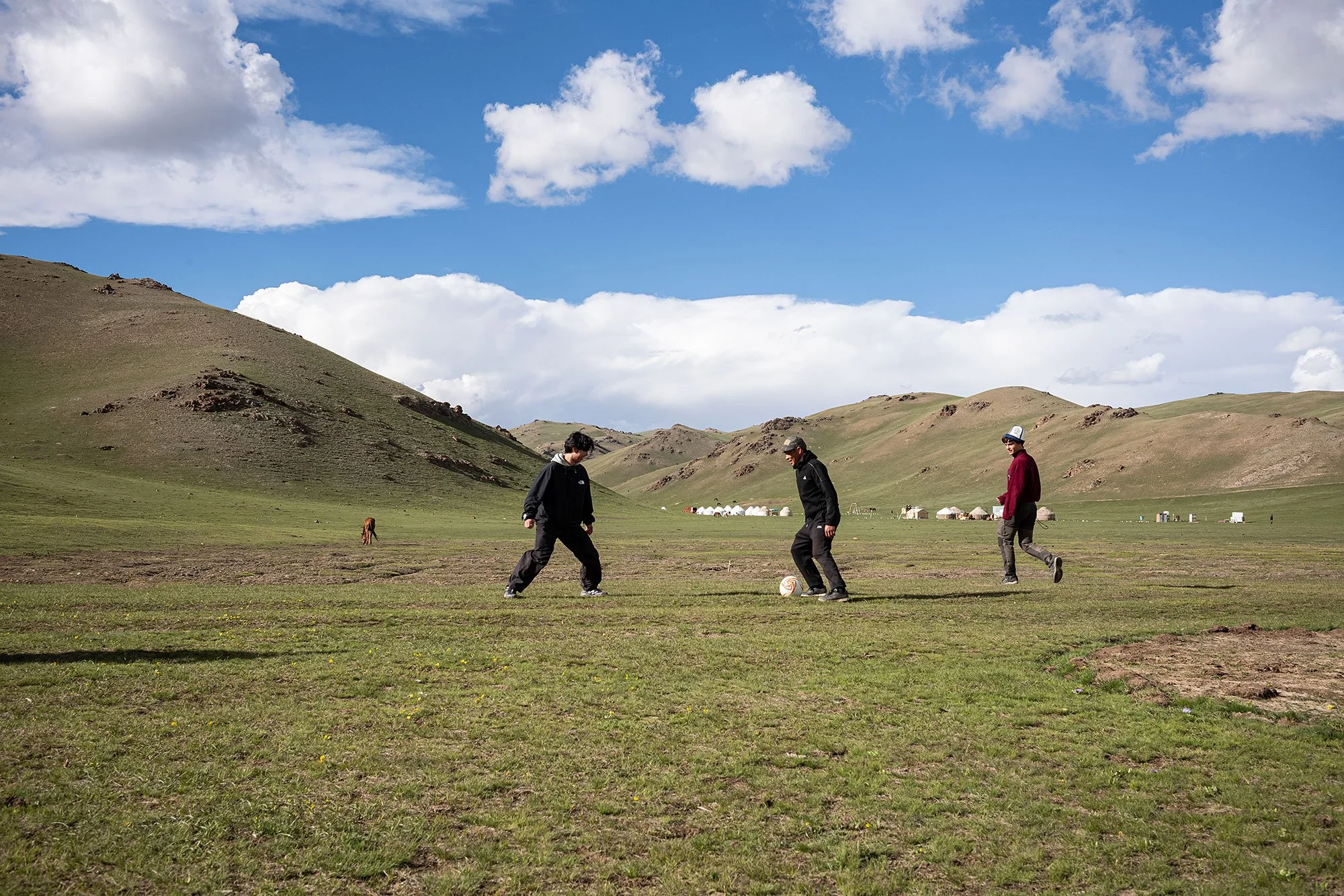 Impromptu fútbol match. Song Kul, Kyrgyzstan.