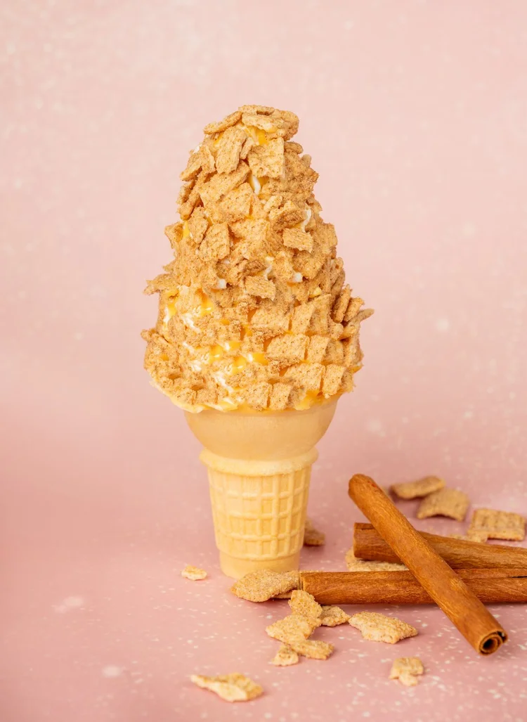 Vanilla soft-serve cone dipped in butterscotch and rolled in Cinnamon Toast Crunch at Merla-Mae Ice Cream in London, Ontario