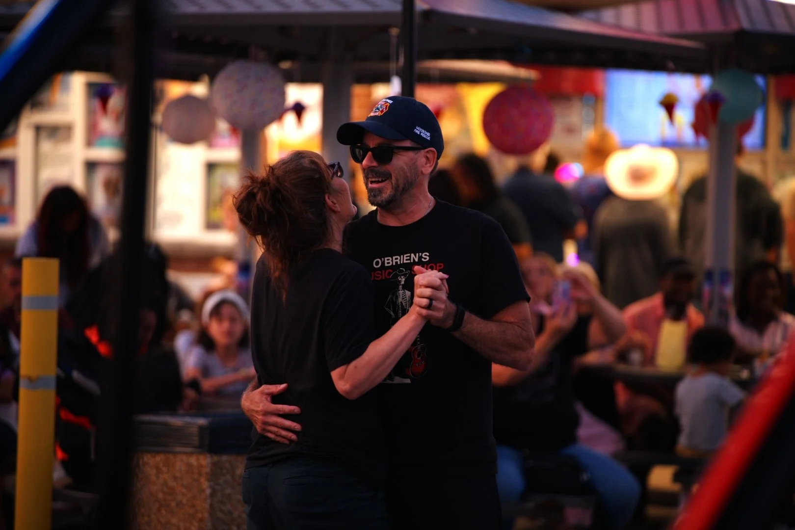A couple dancing under the decorations at Merla-Mae's National Ice Cream Day 2026