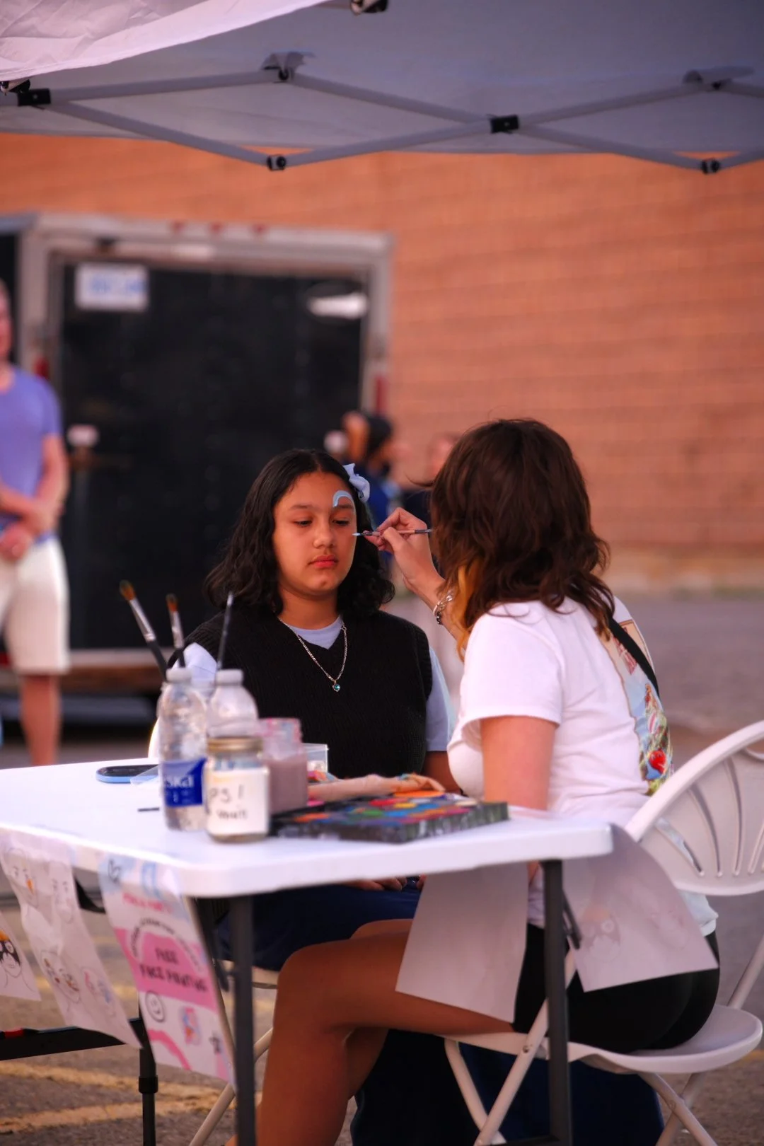 Face painting in the family activities area at National Ice Cream Day 2026, Merla-Mae London Ontario