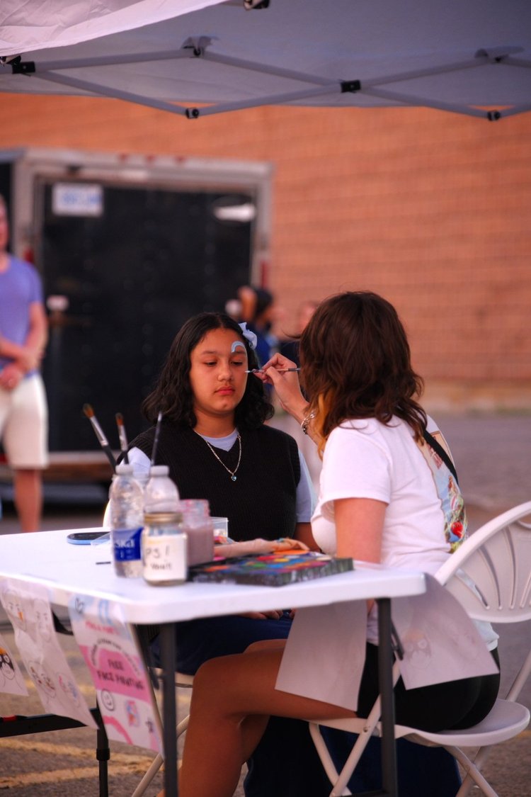Face painting in the family activities area at National Ice Cream Day 2026, Merla-Mae London Ontario
