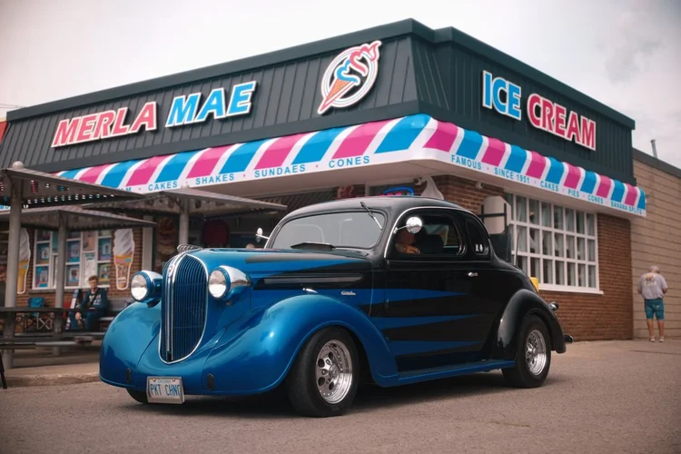 1938 Plymouth Business Coupe parked outside Merla-Mae Ice Cream at the Chrome & Cones Car Show