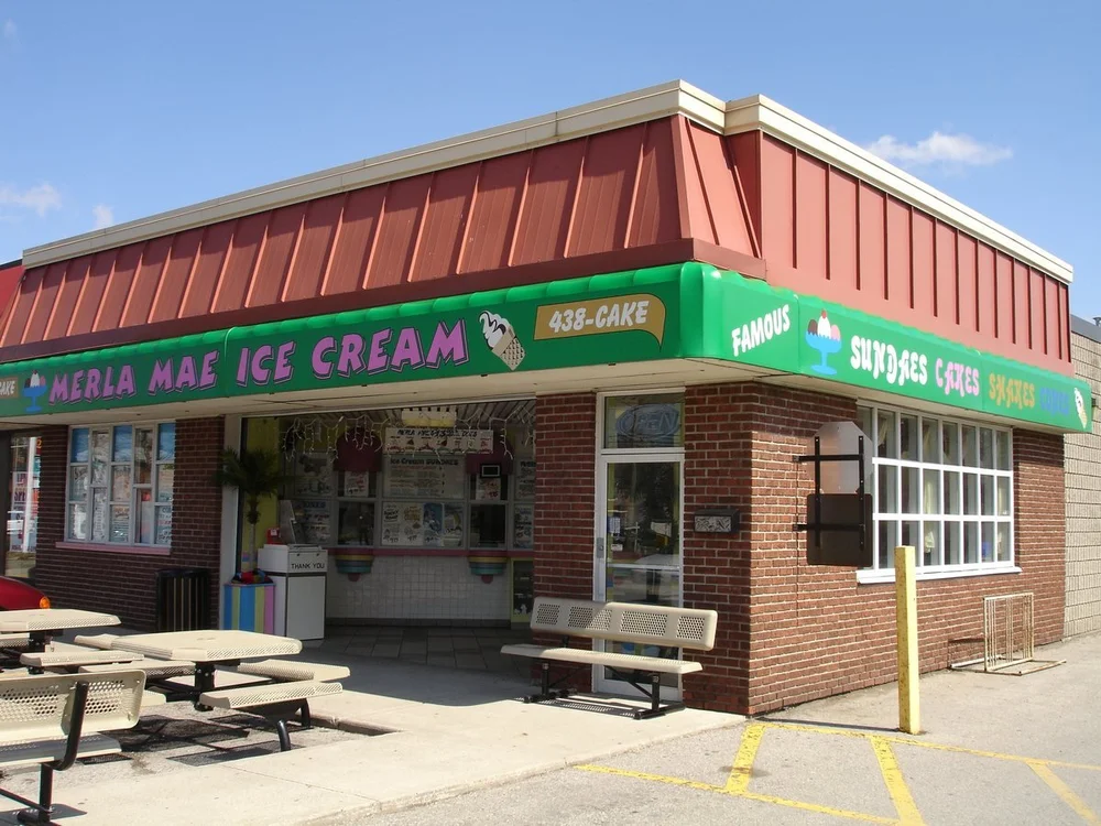 Merla-Mae Ice Cream storefront with its green awning and 438-CAKE sign in London, Ontario, in 2009