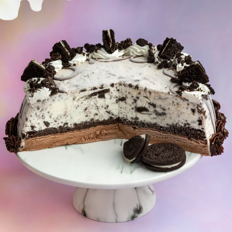 Oreo ice cream cake on a cake stand, cut open, with Oreo cookies on top at Merla-Mae Ice Cream in London, Ontario