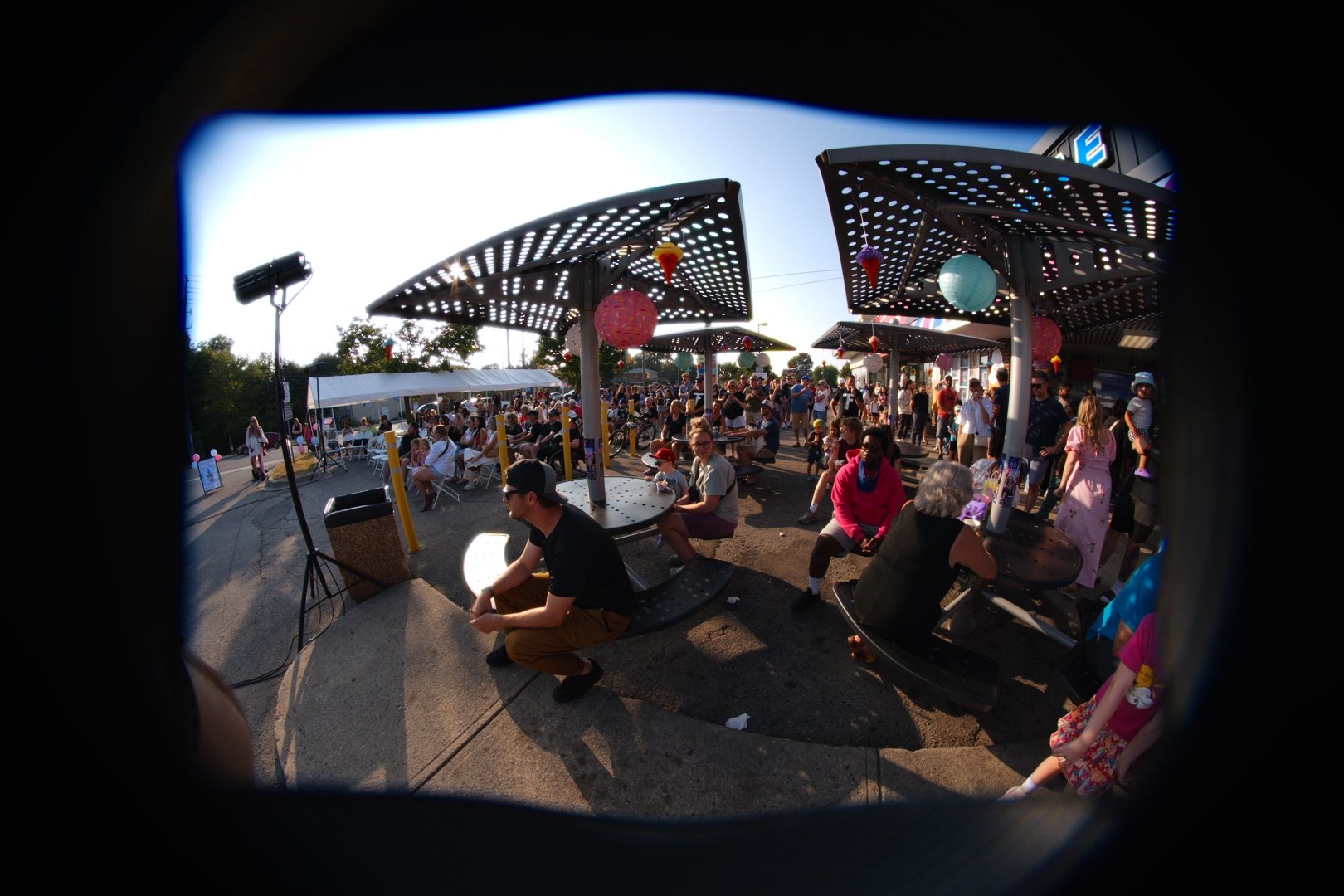 The shaded seating area packed with guests at Merla-Mae's National Ice Cream Day 2026