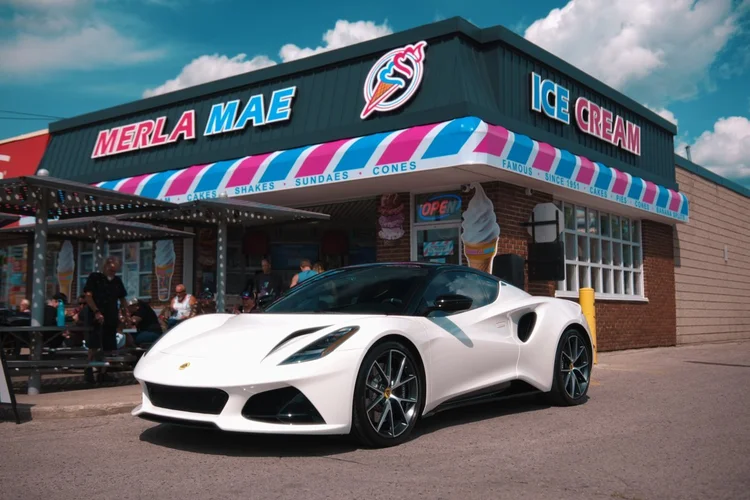 White Lotus Emira sports car parked outside Merla-Mae Ice Cream at the Chrome & Cones Car Show