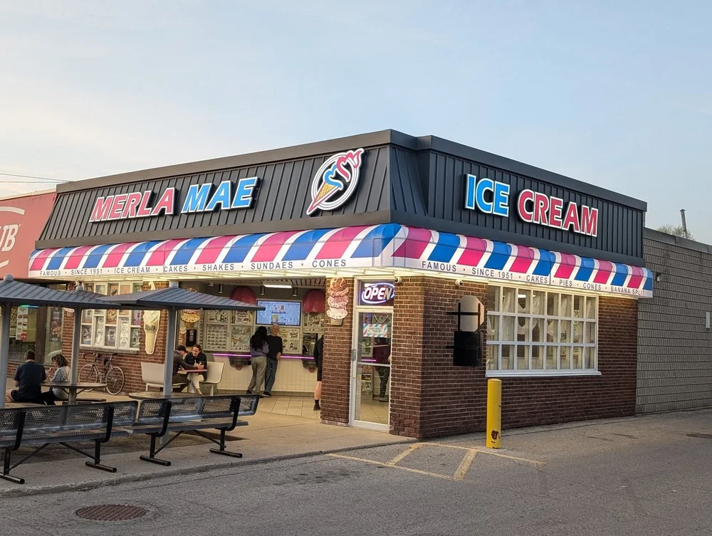 Merla-Mae Ice Cream storefront with its red, white and blue striped awning at 1080 Adelaide St. N in London, Ontario