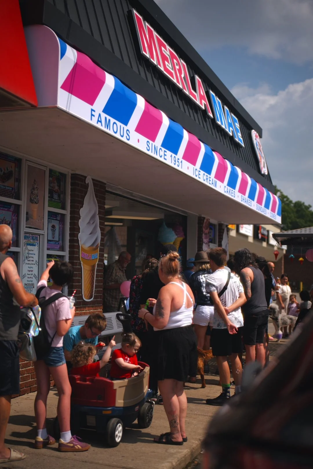 Guests and families lined up outside Merla-Mae during National Ice Cream Day 2026 in London, Ontario
