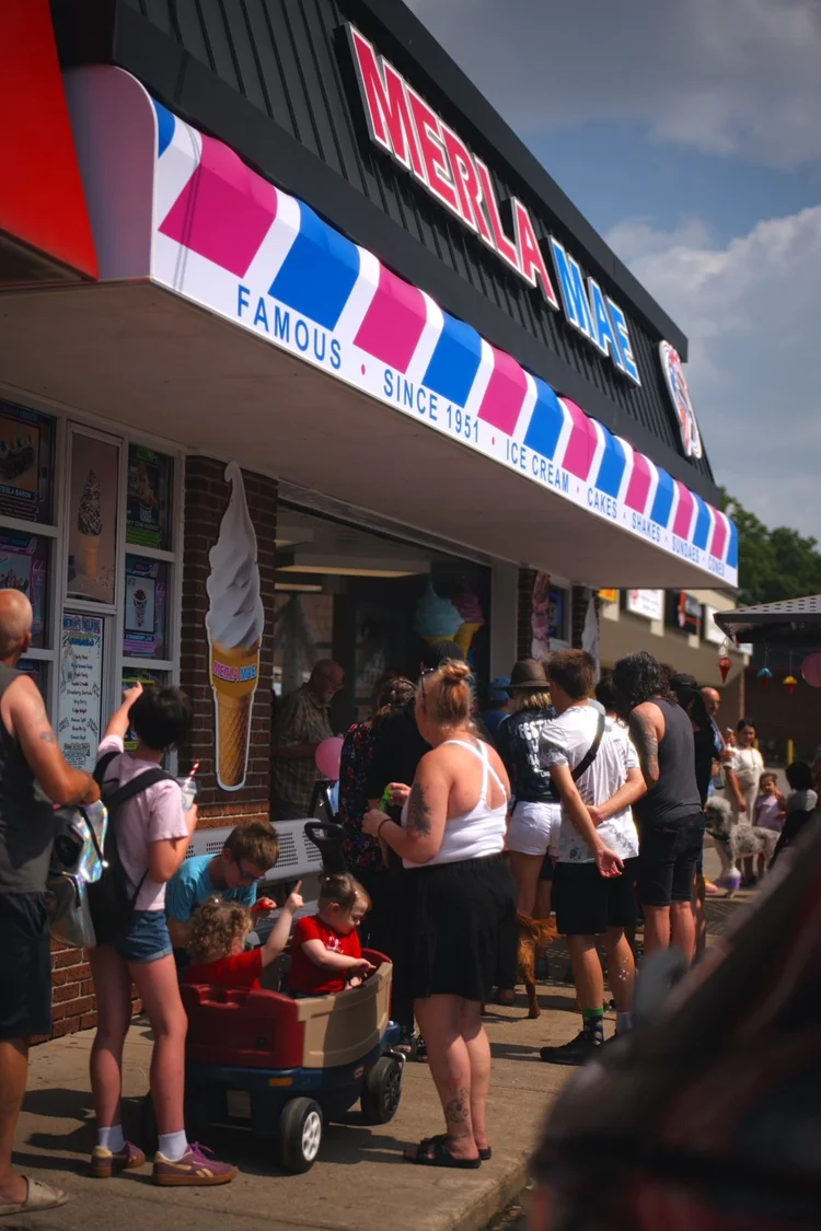 Guests and families lined up outside Merla-Mae during National Ice Cream Day 2026 in London, Ontario