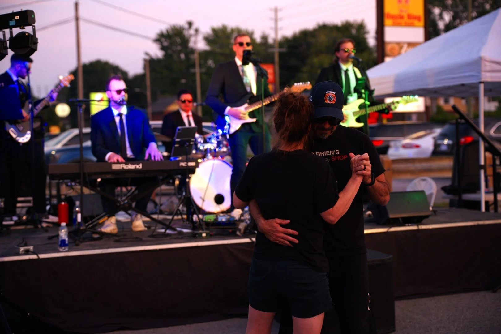 A couple dancing to Turning Corners at Merla-Mae's National Ice Cream Day 2026 in London, Ontario