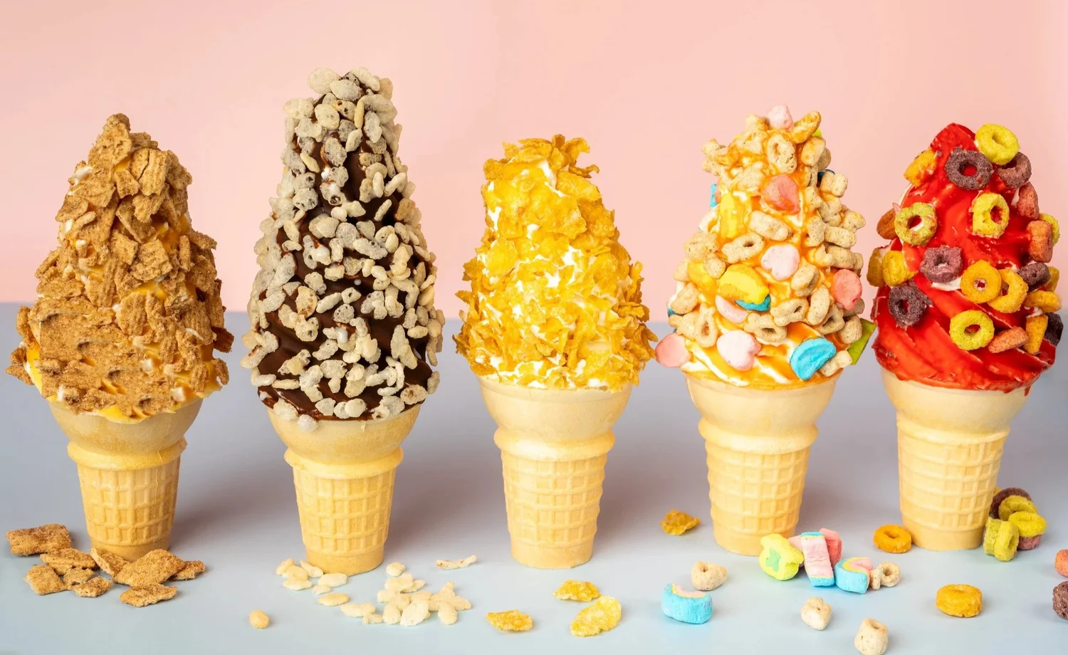 Five soft-serve cones dipped and rolled in Cinnamon Toast Crunch, Rice Krispies, Frosted Flakes, Lucky Charms and Froot Loops at Merla-Mae Ice Cream in London, Ontario