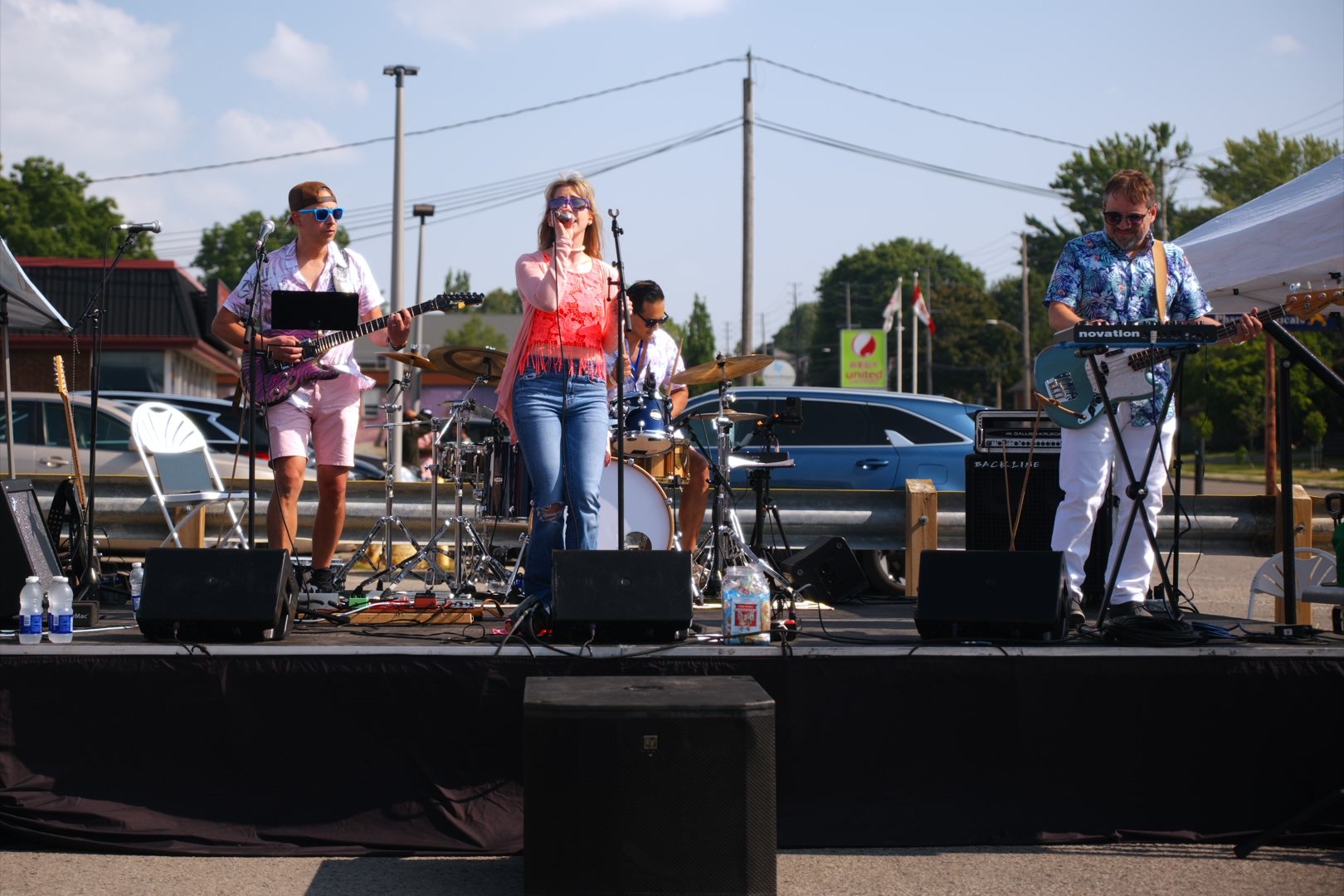 Sweet Theory performing on stage at National Ice Cream Day 2026, Merla-Mae in London, Ontario