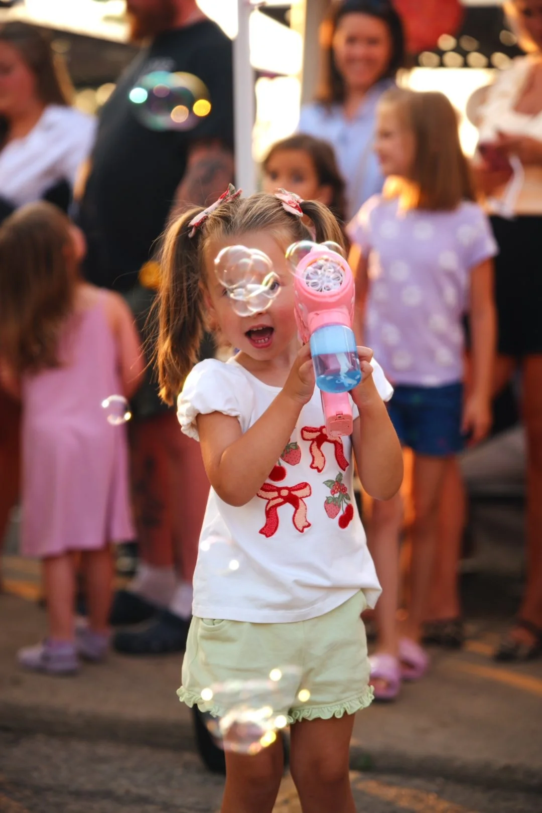 A young guest with her ice cream at Merla-Mae's National Ice Cream Day 2026 in London, Ontario