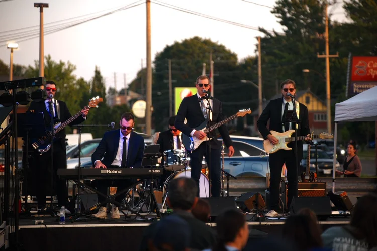 The five-piece Turning Corners performing at Merla-Mae's National Ice Cream Day 2026
