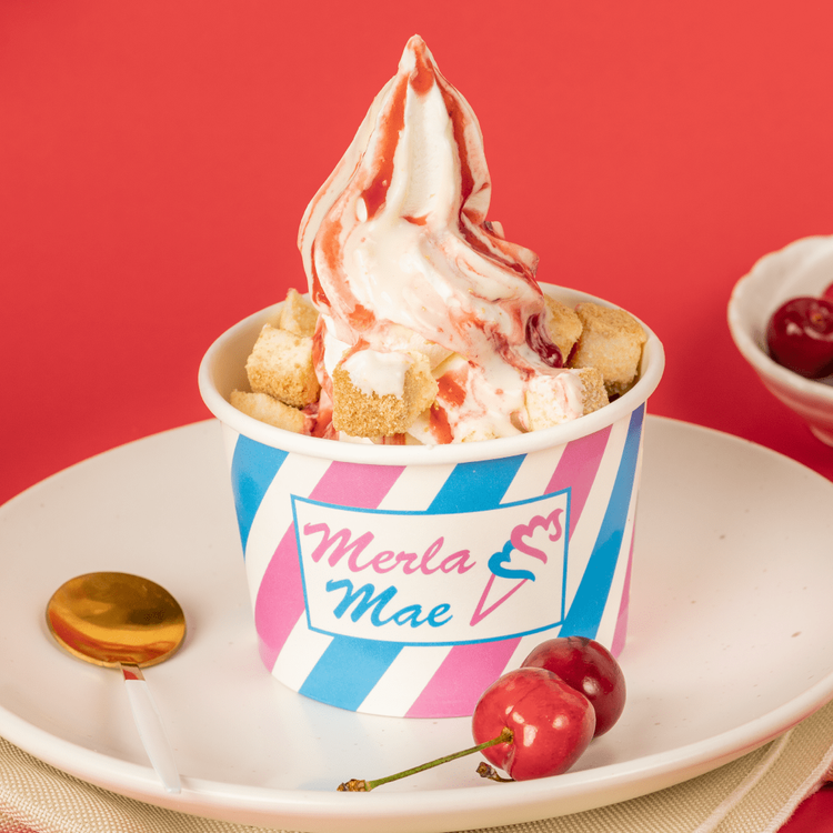 New York Cheesecake sundae with cheesecake bites and a red fruit topping at Merla-Mae Ice Cream in London, Ontario