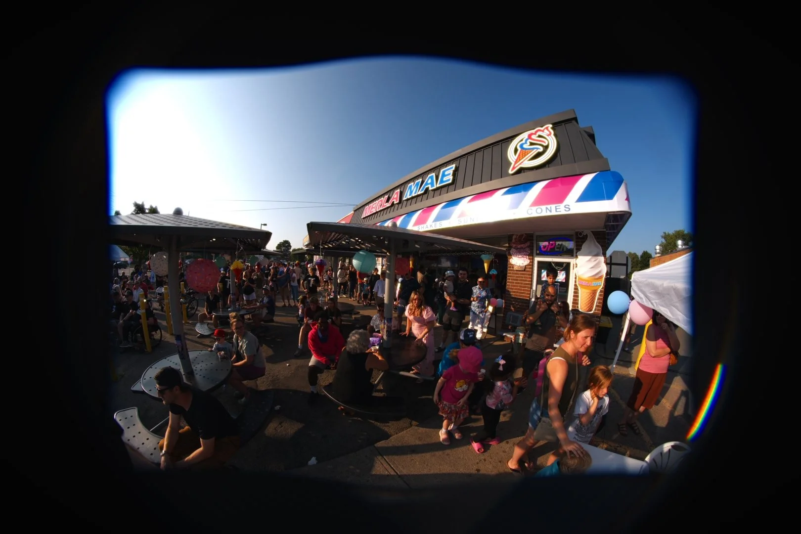 A crowd outside the Merla-Mae ice cream stand during National Ice Cream Day 2026