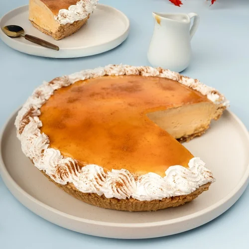 Pumpkin ice cream pie with a caramel glaze, cinnamon-dusted whipped cream and a graham crust, with a slice cut out, at Merla-Mae Ice Cream in London, Ontario