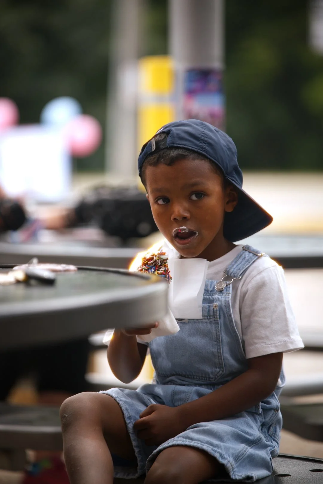 A young guest enjoying Merla-Mae's National Ice Cream Day 2026 in London, Ontario