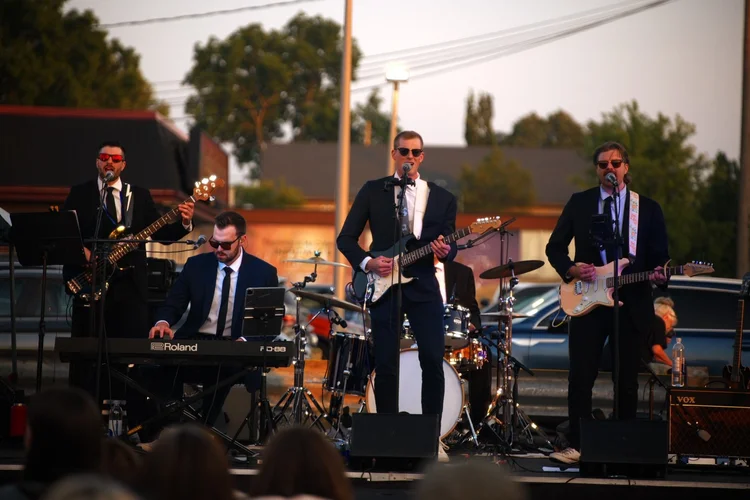Turning Corners' full band on stage at National Ice Cream Day 2026, Merla-Mae in London, Ontario