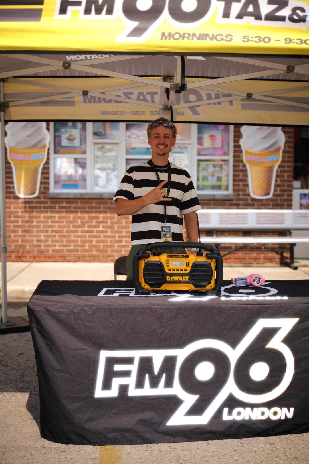 An FM96 London host at the radio booth during National Ice Cream Day 2026 at Merla-Mae
