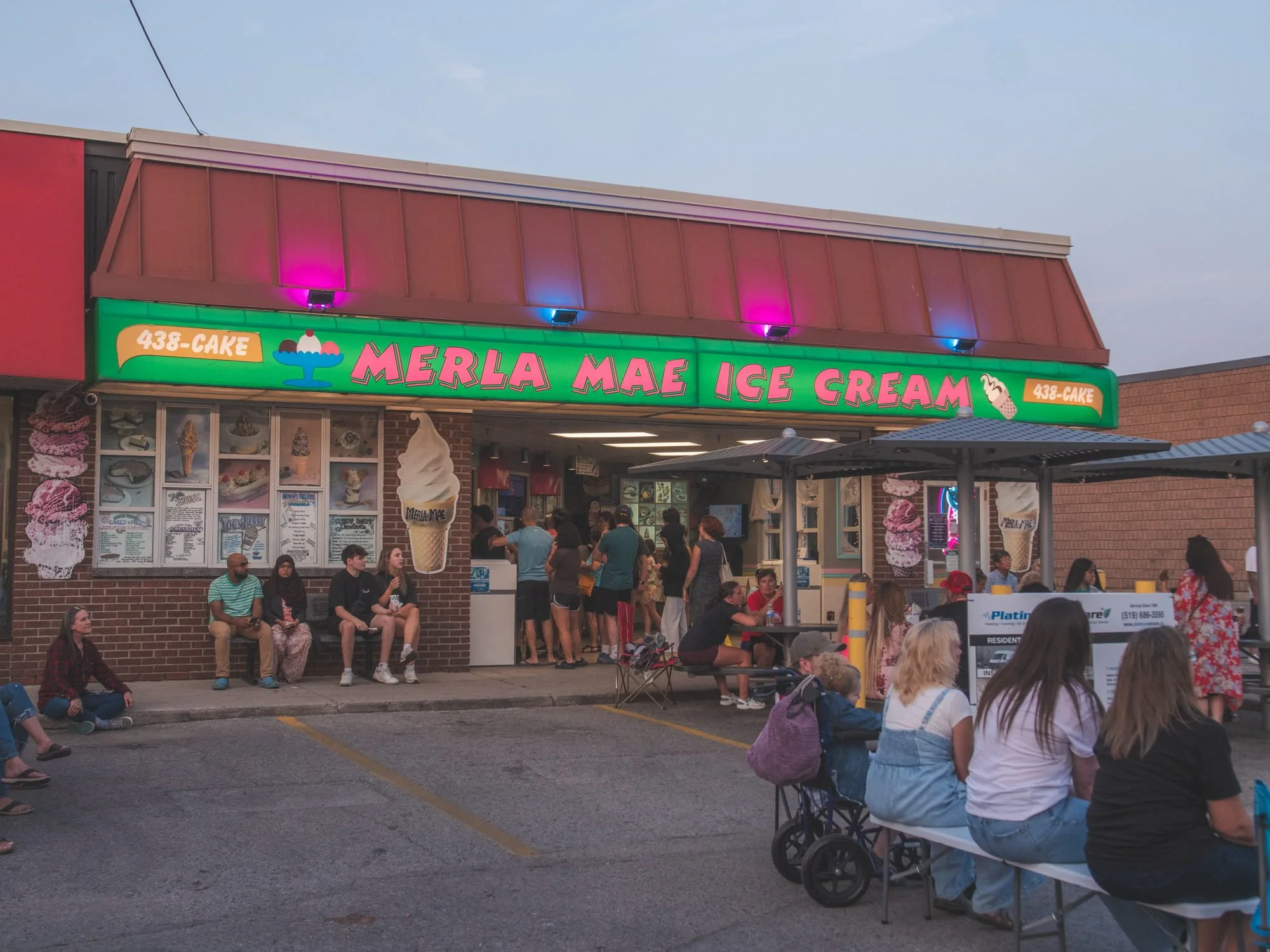 Guests lined up at Merla-Mae Ice Cream during National Ice Cream Day 2024 in London, Ontario