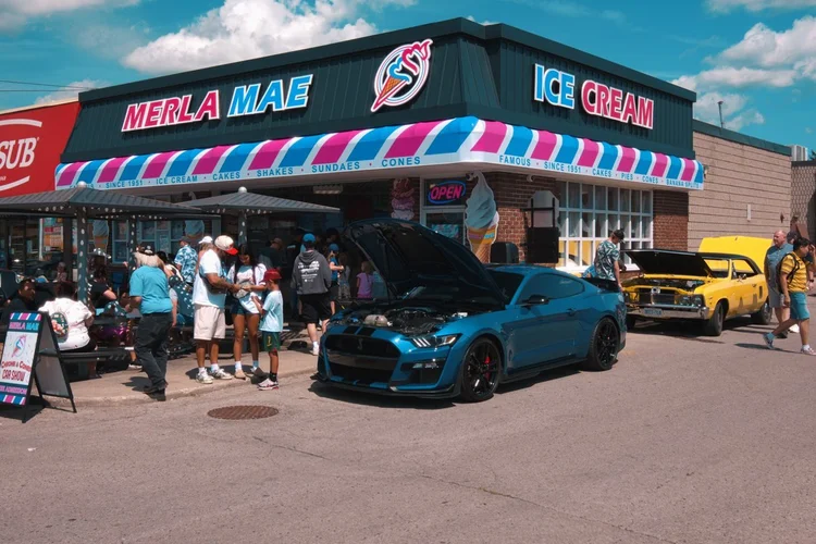 Blue 2021 Shelby GT500 parked outside Merla-Mae Ice Cream at the Chrome & Cones Car Show